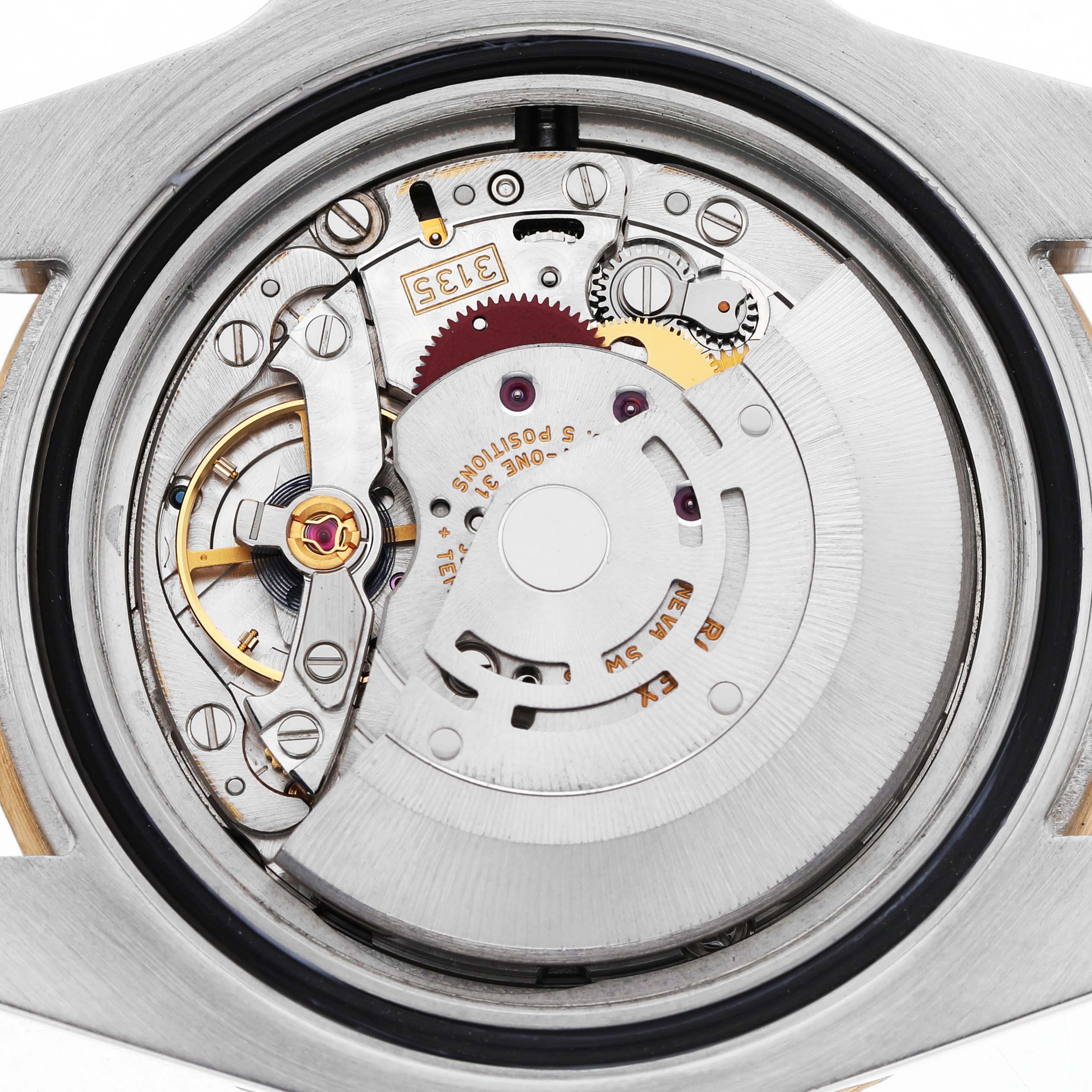 The image shows an internal view of a Rolex Submariner 116613F Men's Steel and Gold (two tone) Blue Dial watch movement, highlighting gears and the balance wheel.