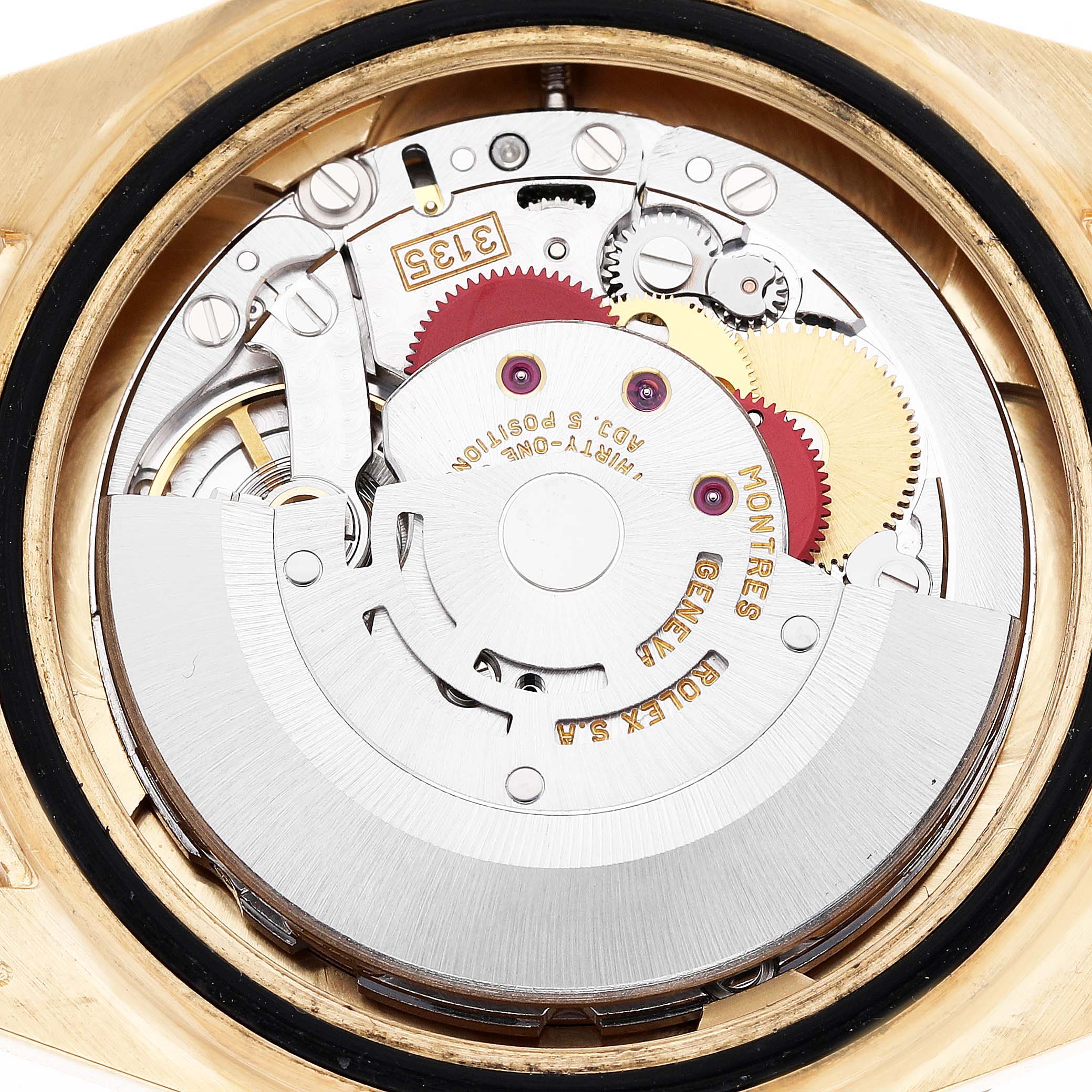 The image shows the movement and internal components of a Rolex Submariner 16618 Men's Yellow Gold Blue Dial watch from a top-down angle.