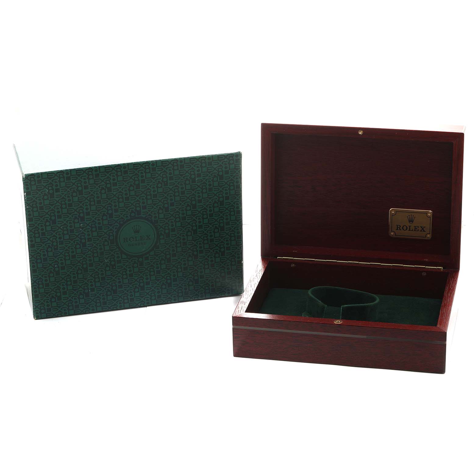 The image shows an open Rolex box for the Submariner model, with a green protective cover beside it.