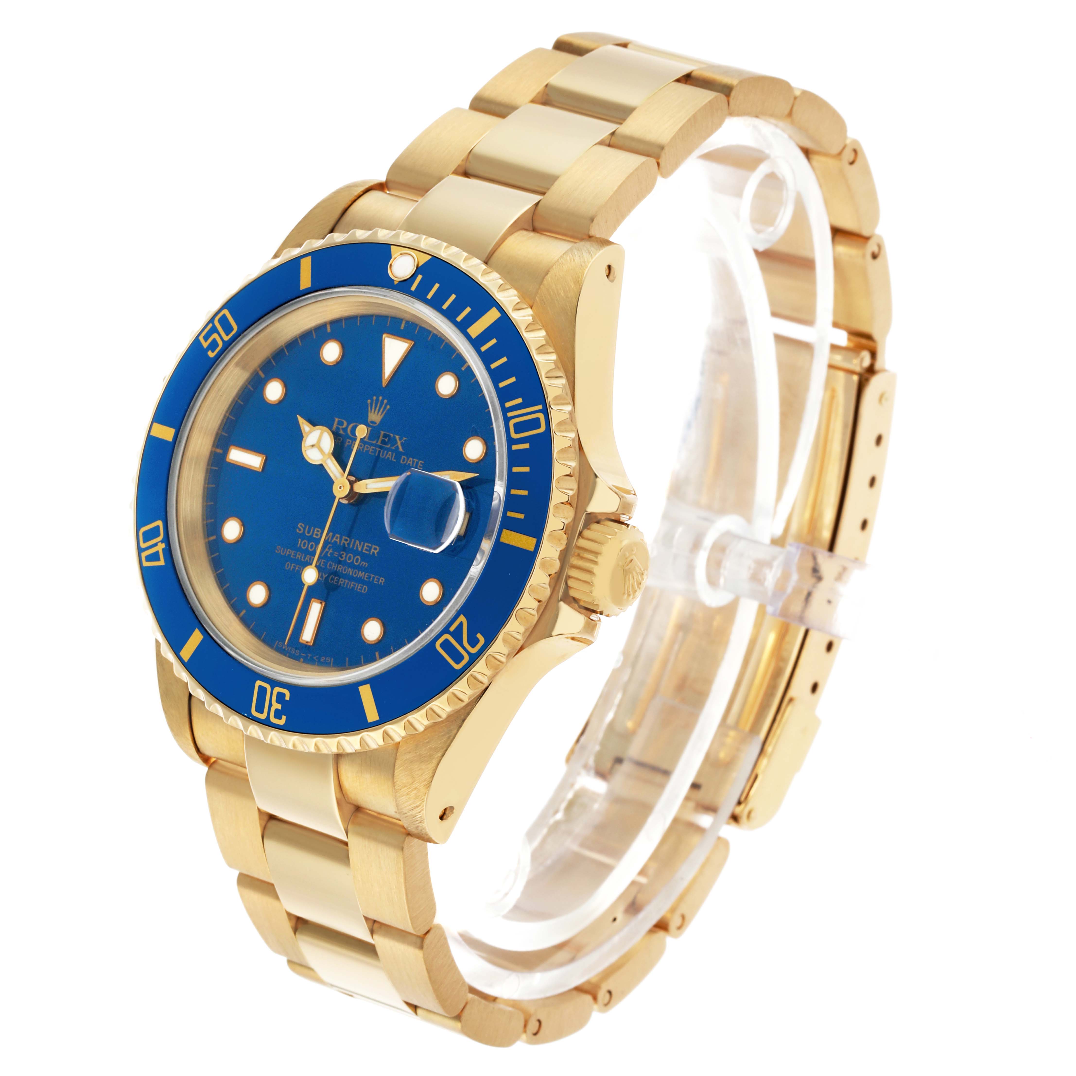 The image shows the Rolex Submariner 16618 Men's Yellow Gold Blue Dial at a three-quarter angle highlighting the blue dial, bezel, case, bracelet, and crown.