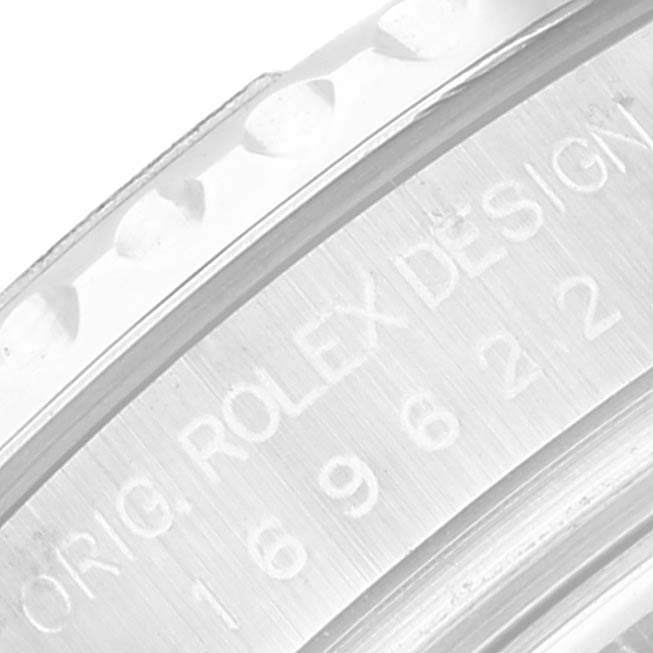 This is a close-up of the case side of a Rolex Yacht-Master 169622 Women
s Stainless Steel Silver Dial 169622 Women
s Stainless Steel Silver Dial, showing the engraved "Orig. Rolex Design" and serial number.