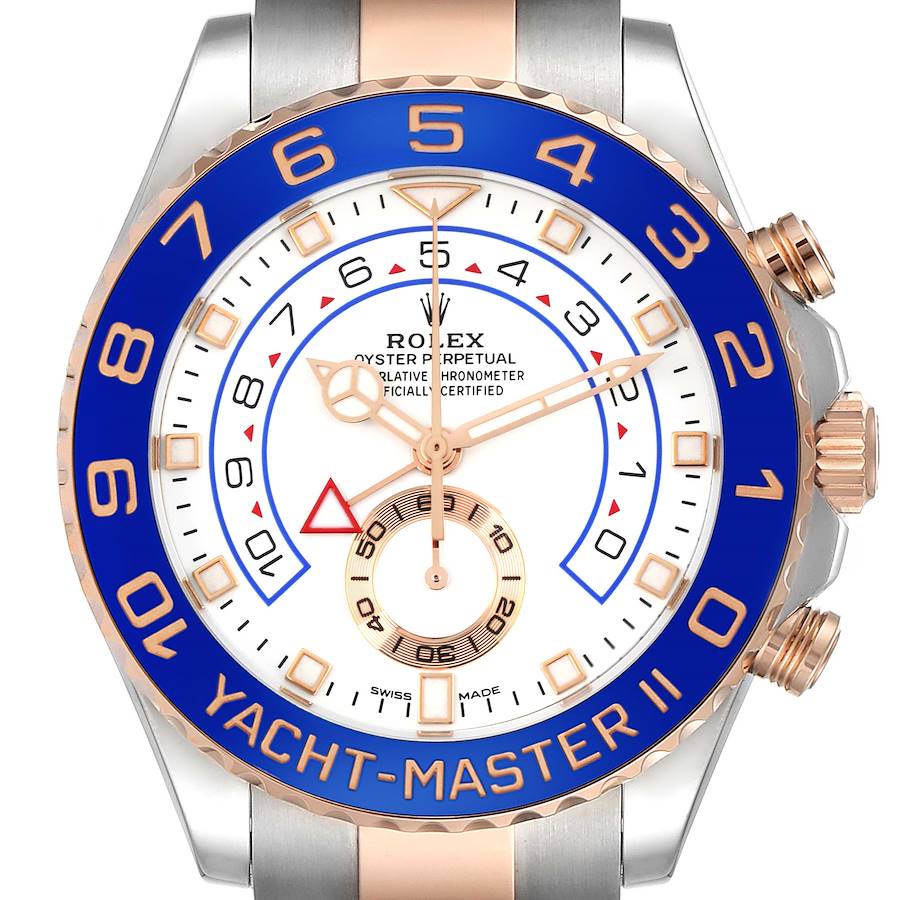 The Rolex Yacht-Master model is shown from the front, displaying its blue bezel and detailed white dial with rose-gold accents.