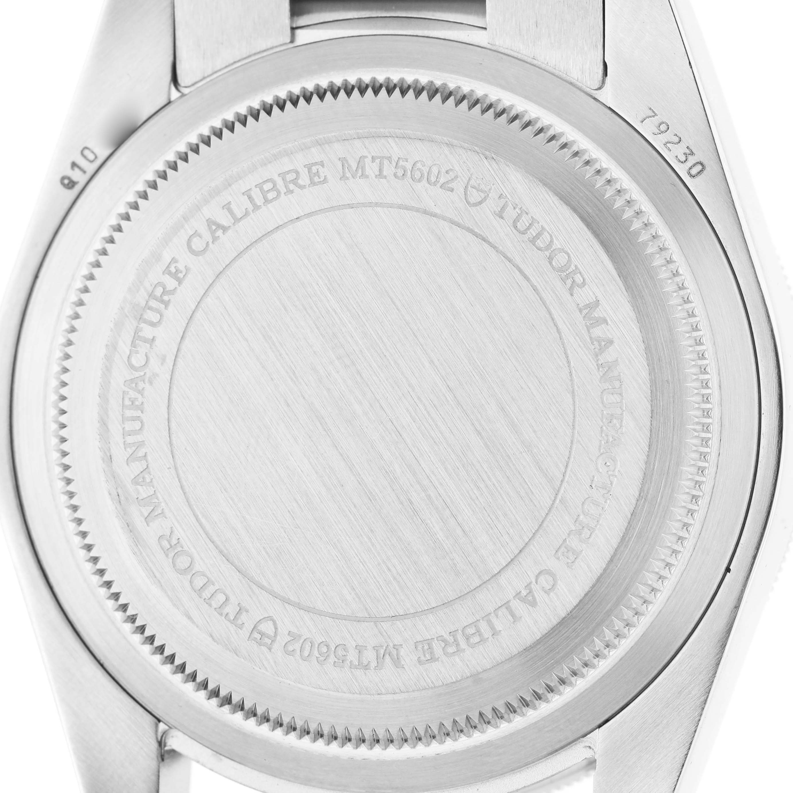 The image shows the case back of the Tudor Heritage Black Bay 79230R-0003 Men's Stainless Steel Black Dial watch, highlighting the engraved details.