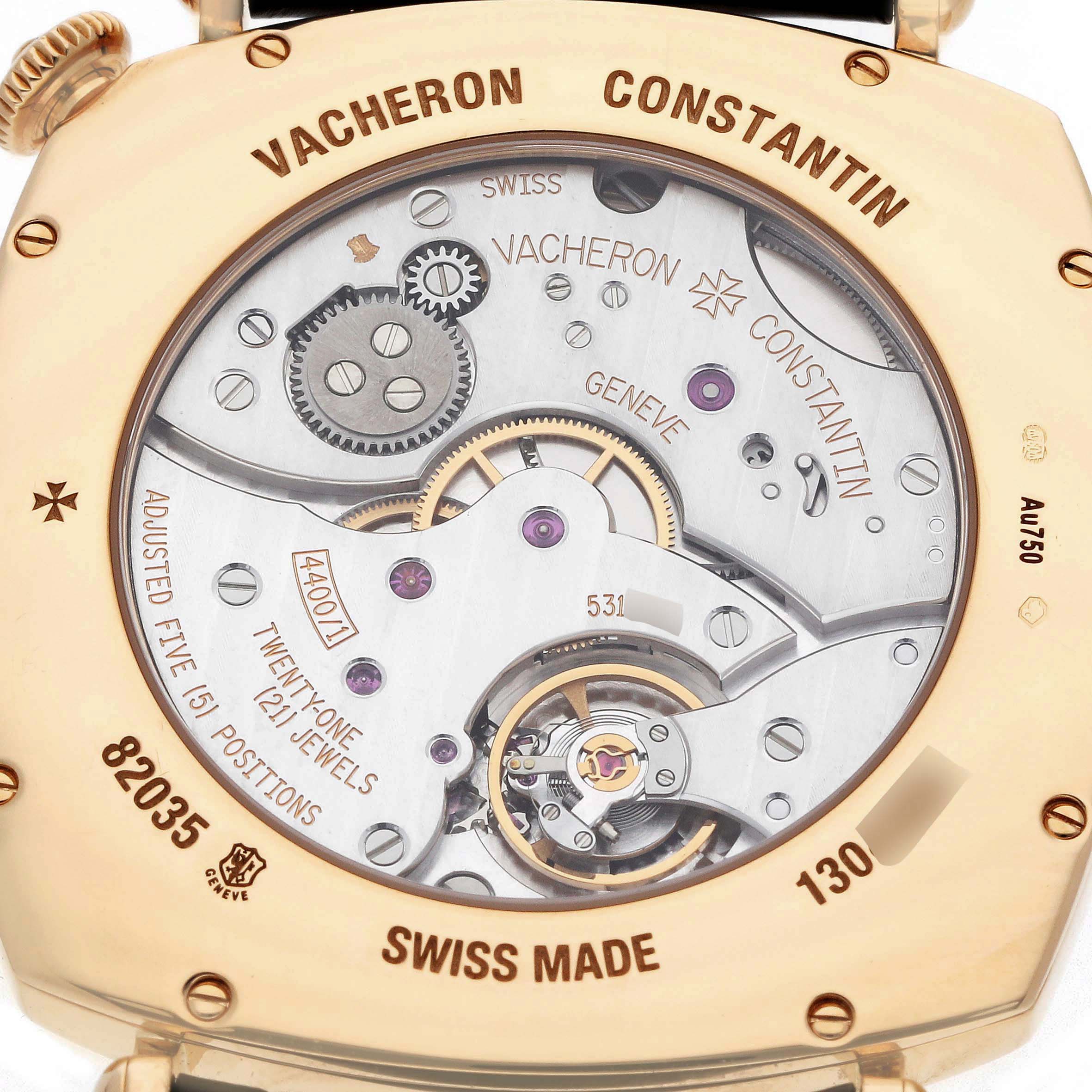 The image shows the case back of the Vacheron Constantin Historiques 82035/000J-9964 Men's Yellow Gold Silver Dial watch, highlighting its intricate movement and engravings.