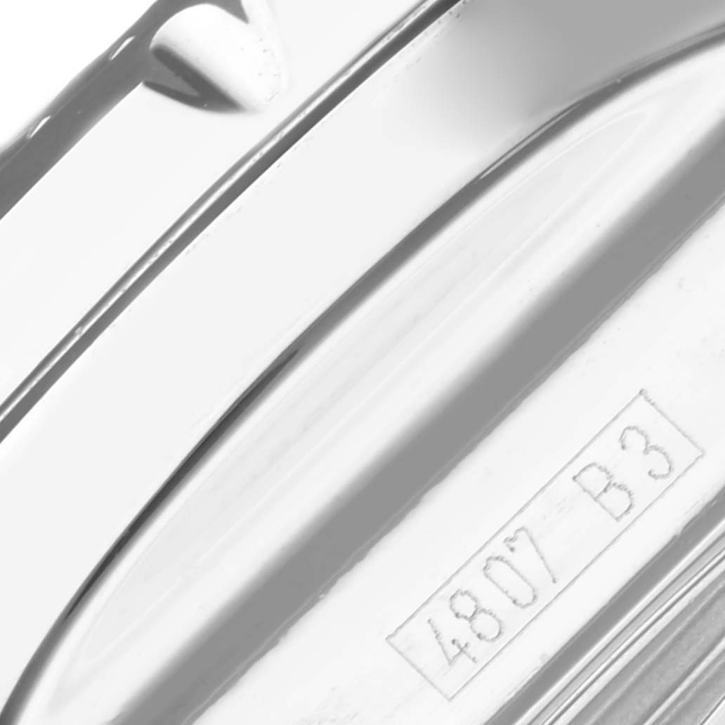 The image shows a close-up of the edge and engraving detail on the Bentley model by Breitling.