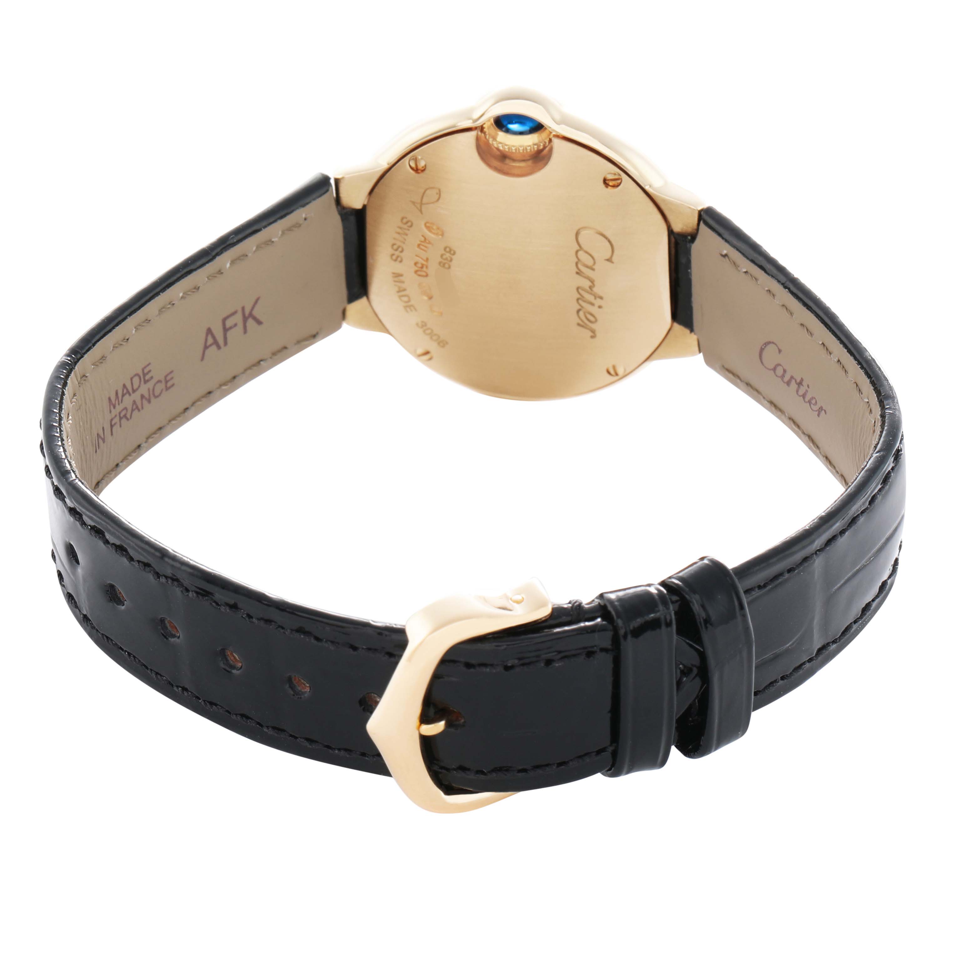 The image shows the back view of a Ballon Bleu by Cartier, highlighting the case back, leather strap, and clasp.