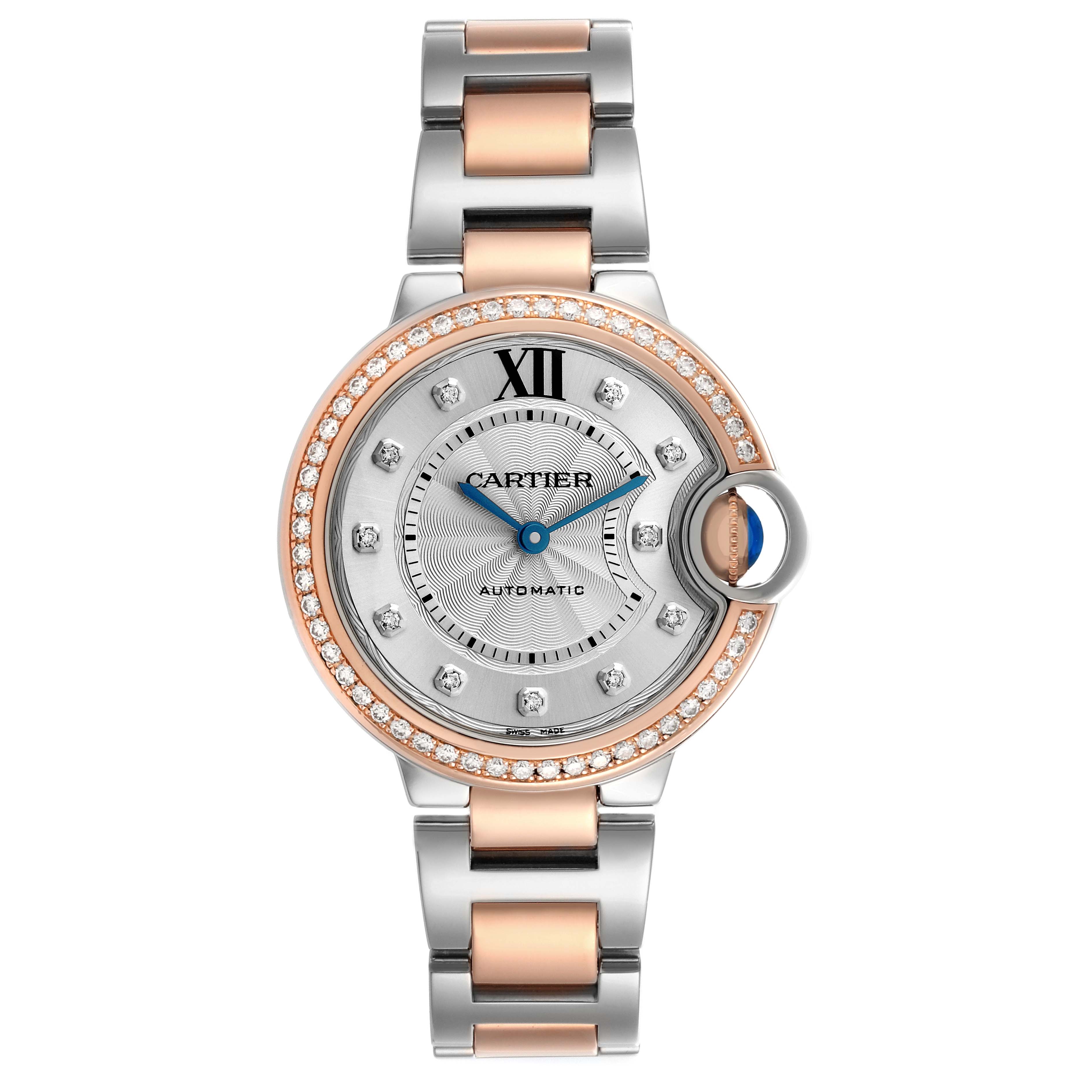 The Cartier Ballon Bleu WE902077 Women's Steel and Gold (two tone) Silver Dial watch is shown from a top-down angle, highlighting its face, bezel, and bracelet.