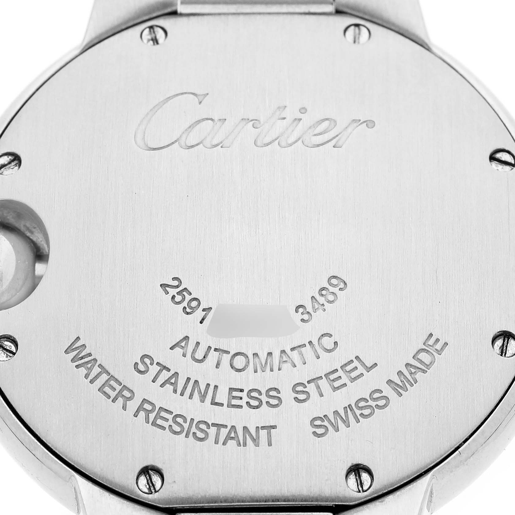 The image shows the back case of a Ballon Bleu by Cartier, displaying engravings and screws.