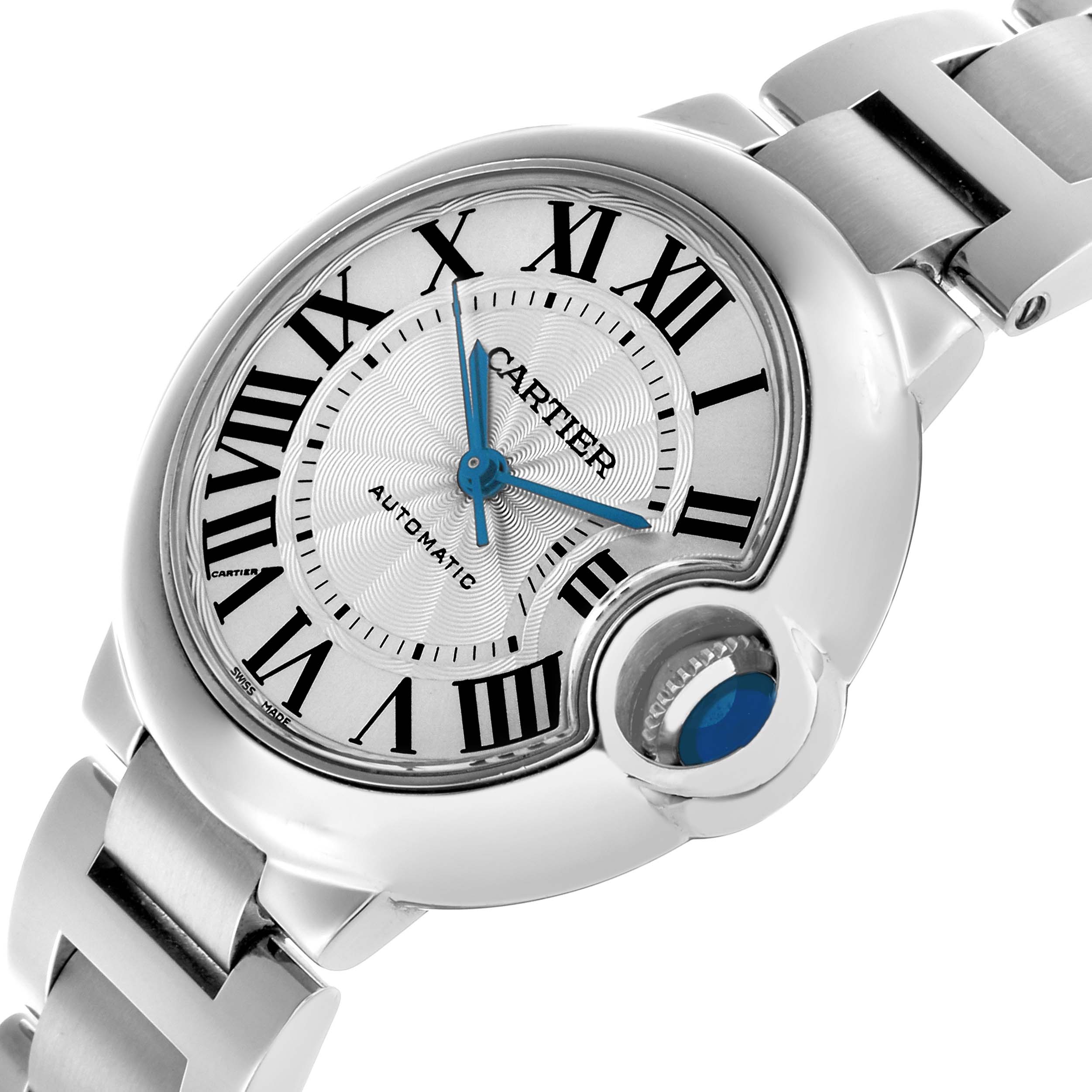 The Cartier Ballon Bleu W6920071 Women's Stainless Steel Silver Dial watch is shown from a top angle highlighting the face, crown, and part of the bracelet.