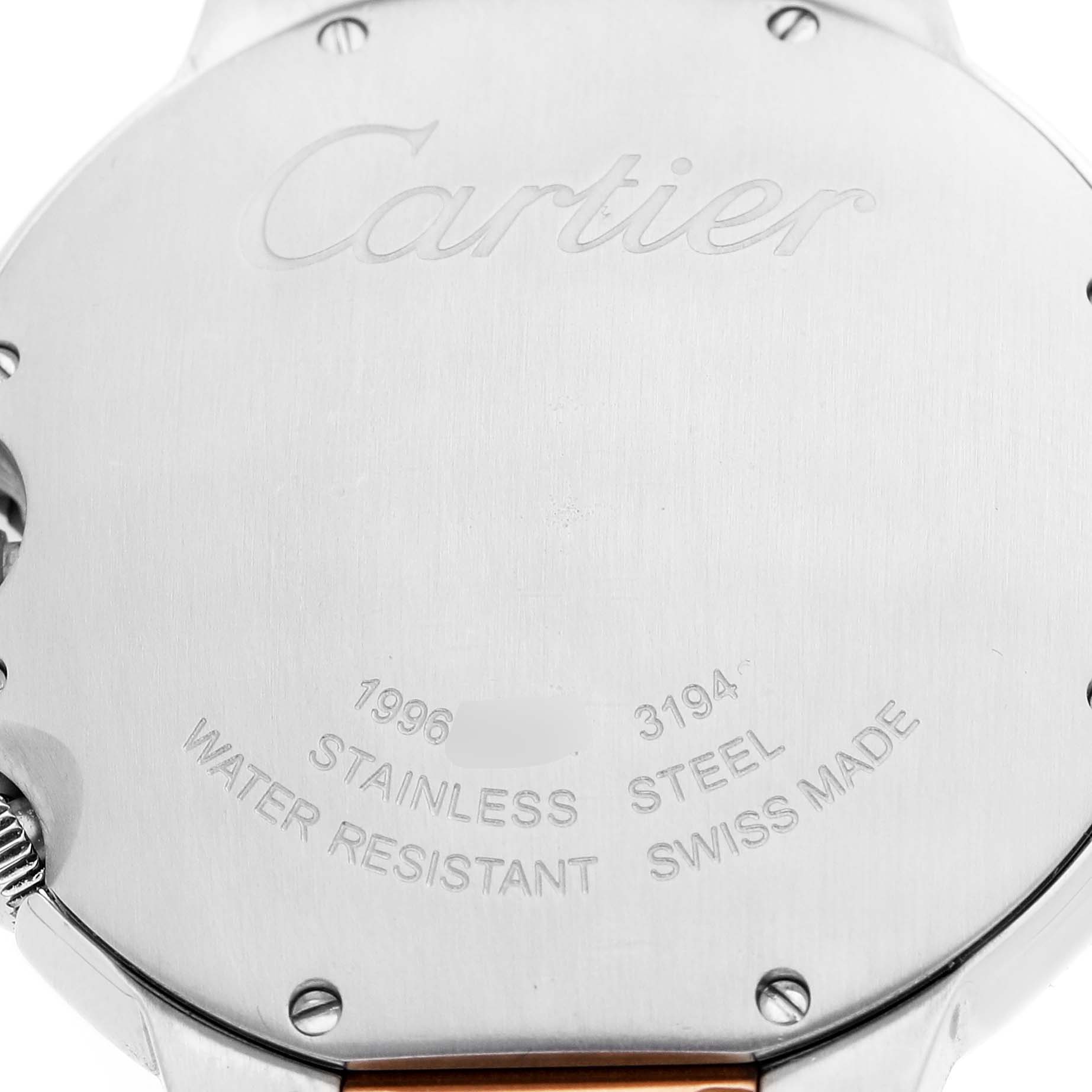 The image shows the back case of a Cartier Ballon Bleu W6920027 Men's Steel and Gold (two tone) Silver Dial watch, displaying engraved details such as brand, material, and serial numbers.