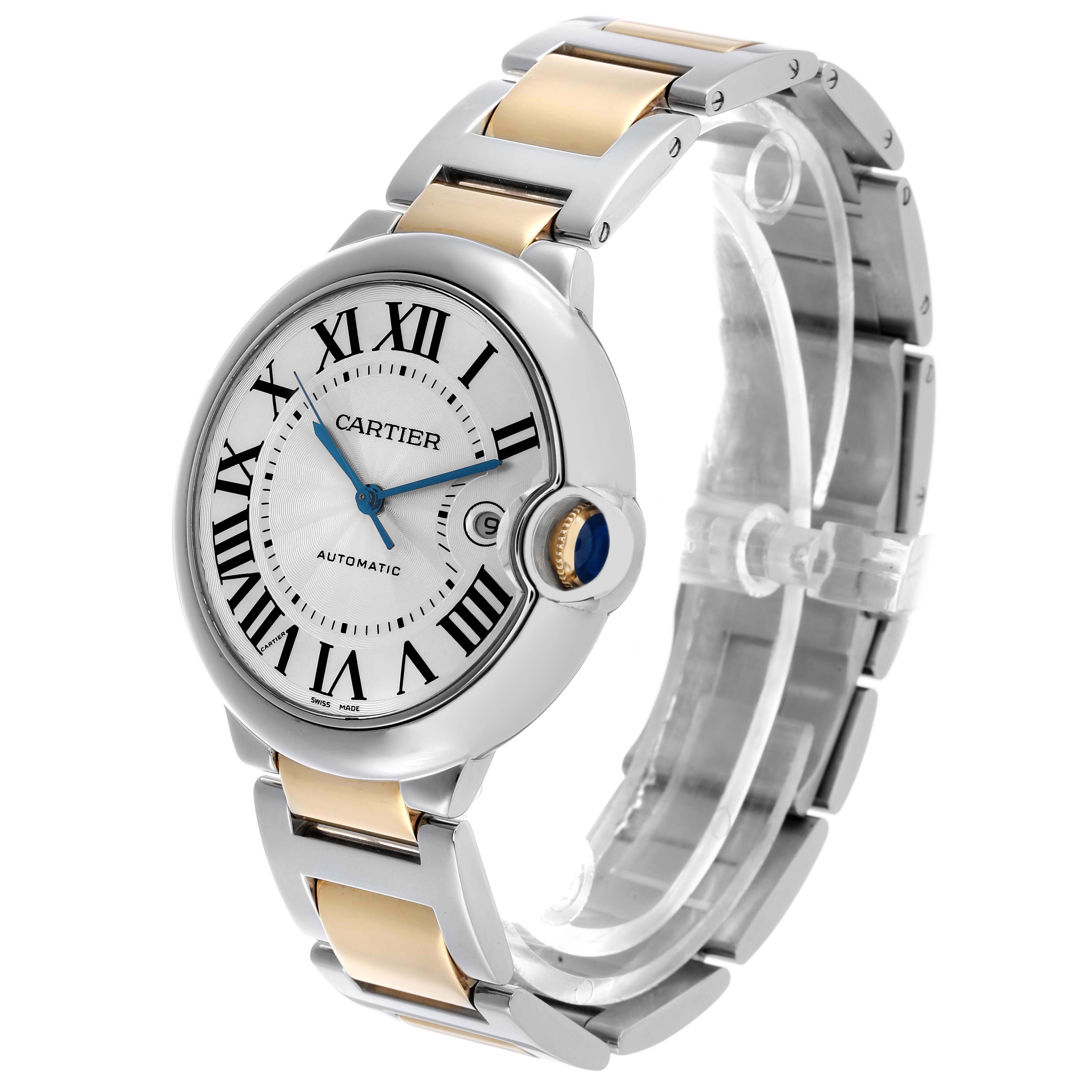 The Cartier Ballon Bleu W69009Z3 Men's Steel and Gold (two tone) Silver Dial watch is shown at a three-quarter angle, highlighting its face, crown, and bi-metal bracelet.