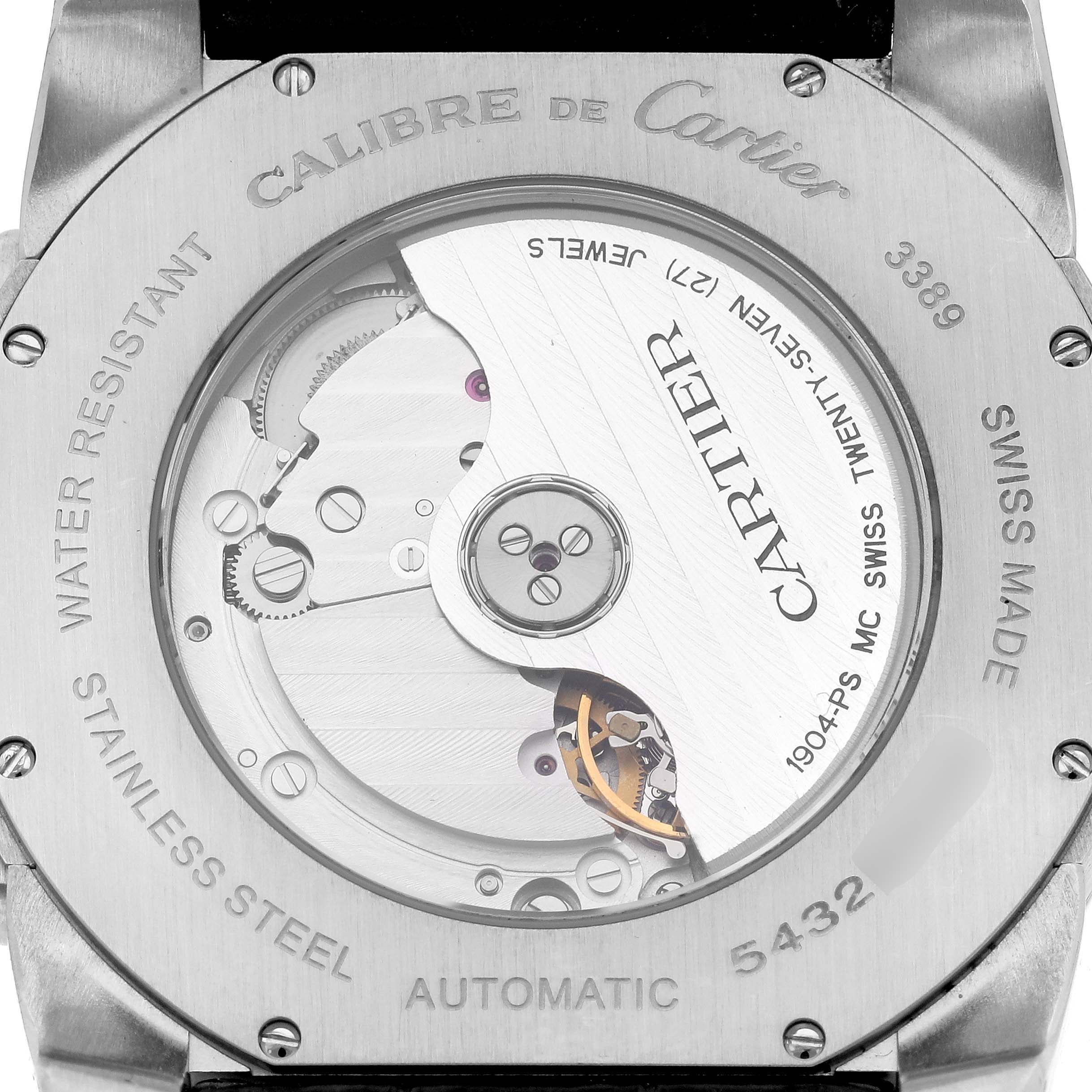 The image shows the back case of a Calibre de Cartier watch, displaying the automatic movement mechanism.