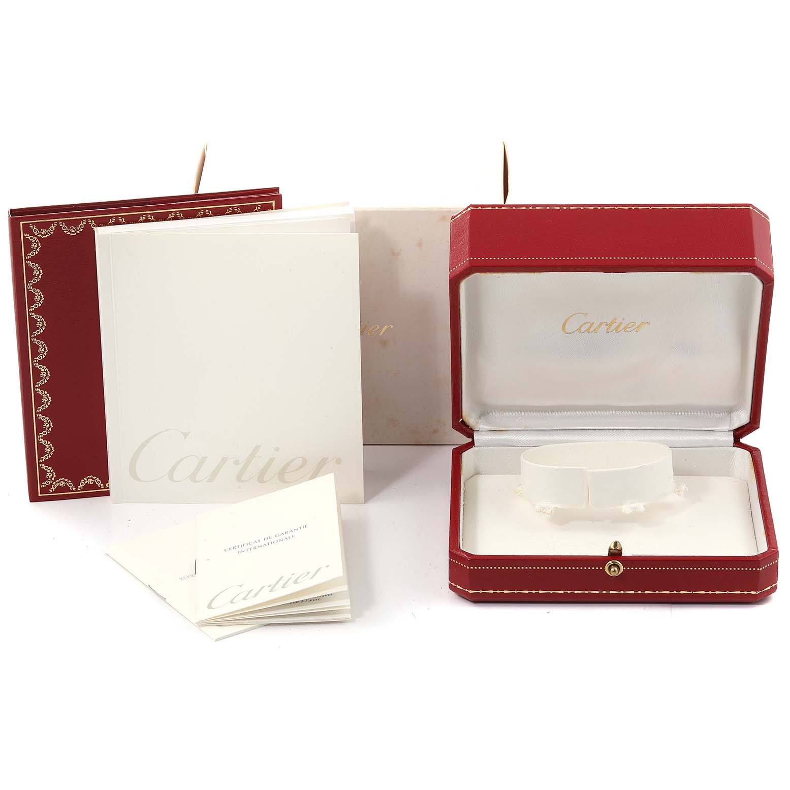 The image shows packaging and booklets for a Cartier Panthere W25014B9 Men's Yellow Gold Silver Dial W25014B9 Men's Yellow Gold Silver Dial watch, including the watch case and manuals.