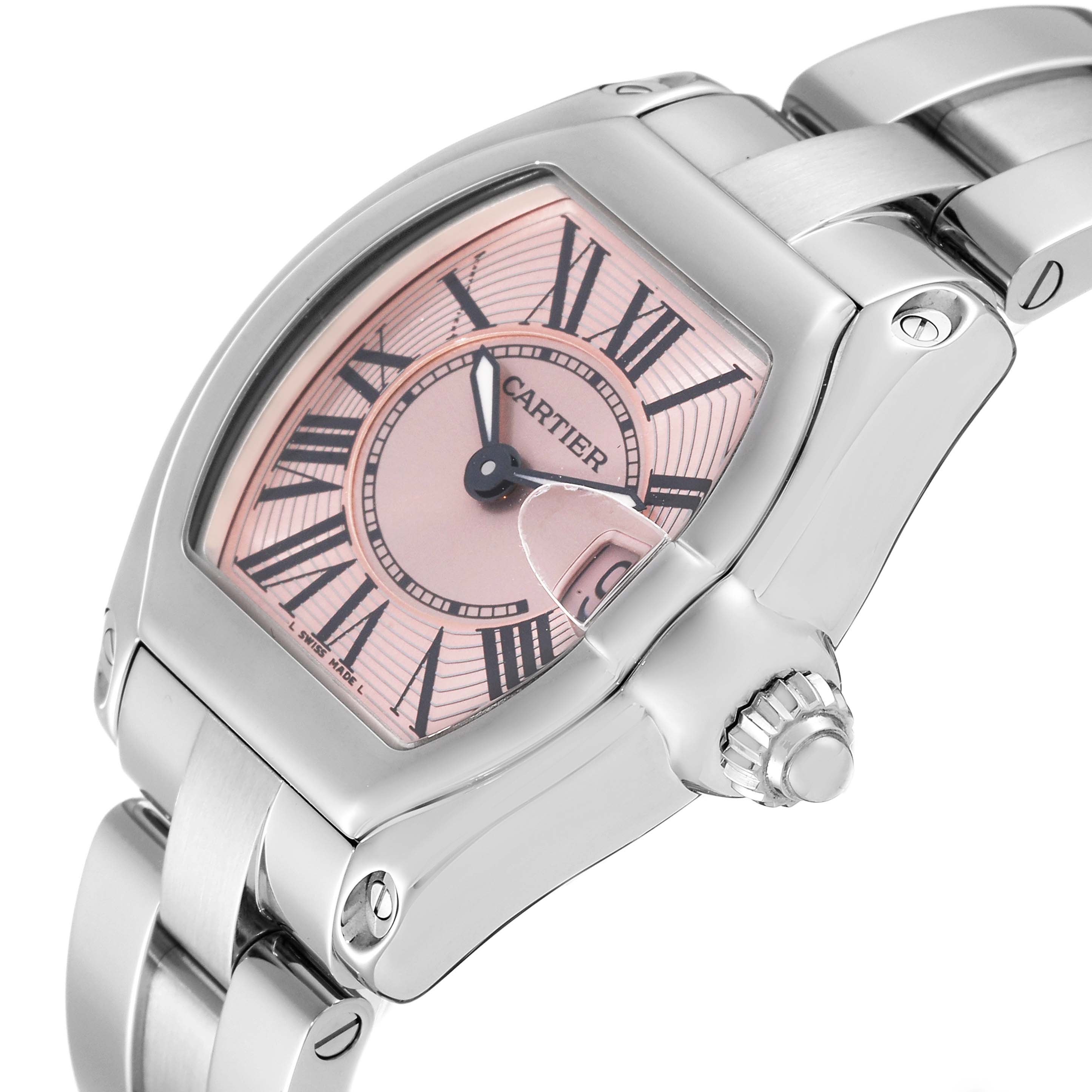 The Cartier Roadster W62017V3 Women's Stainless Steel Pink Dial W62017V3 Women's Stainless Steel Pink Dial watch is shown at a slight side angle, highlighting its pink dial, Roman numerals, date window, and part of the bracelet.