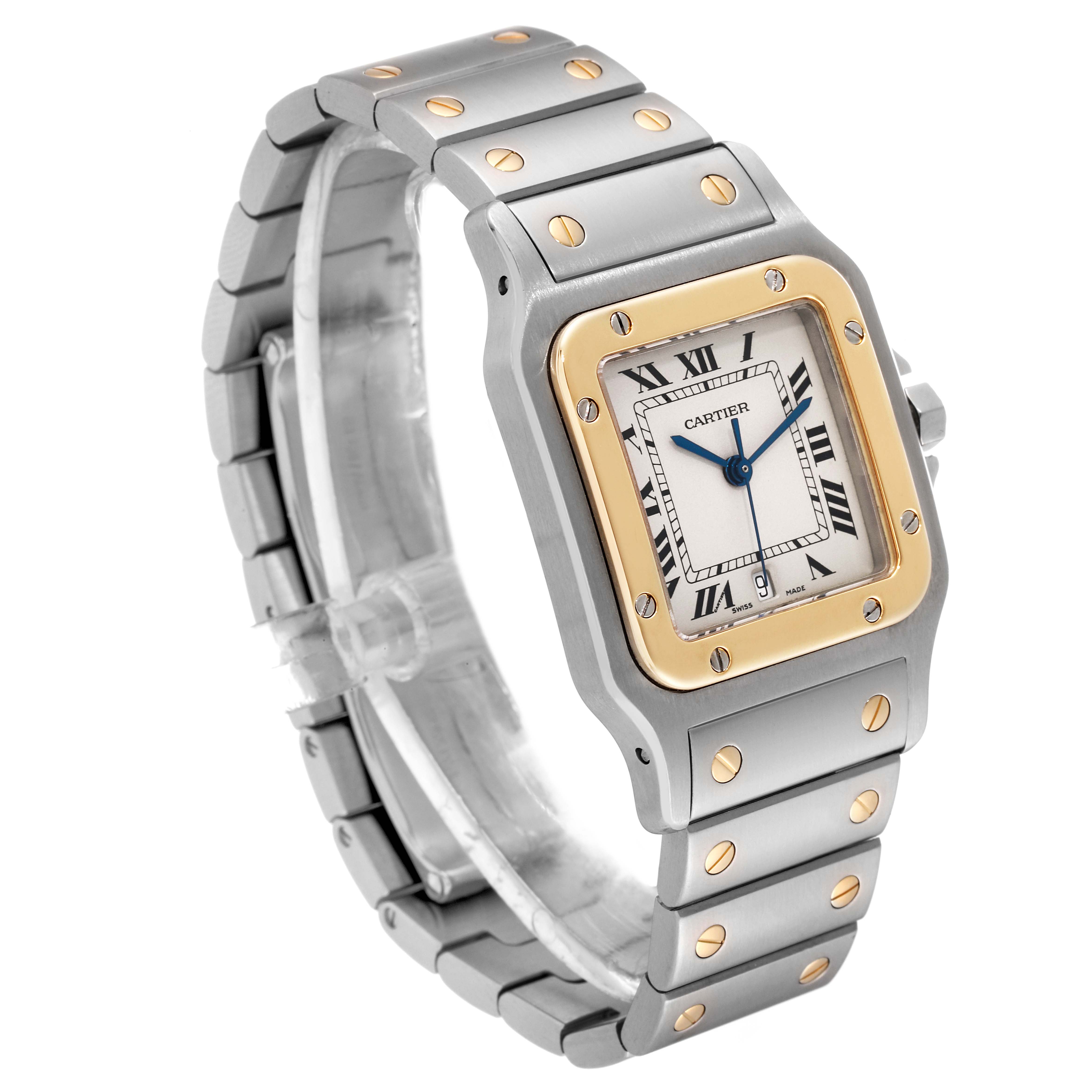 The image shows a Cartier Santos W20011C4 Men
s Steel and Gold (two tone) Silver Dial W20011C4 Men
s Steel and Gold (two tone) Silver Dial watch at an angled view, displaying its face, bezel, and part of the bracelet.