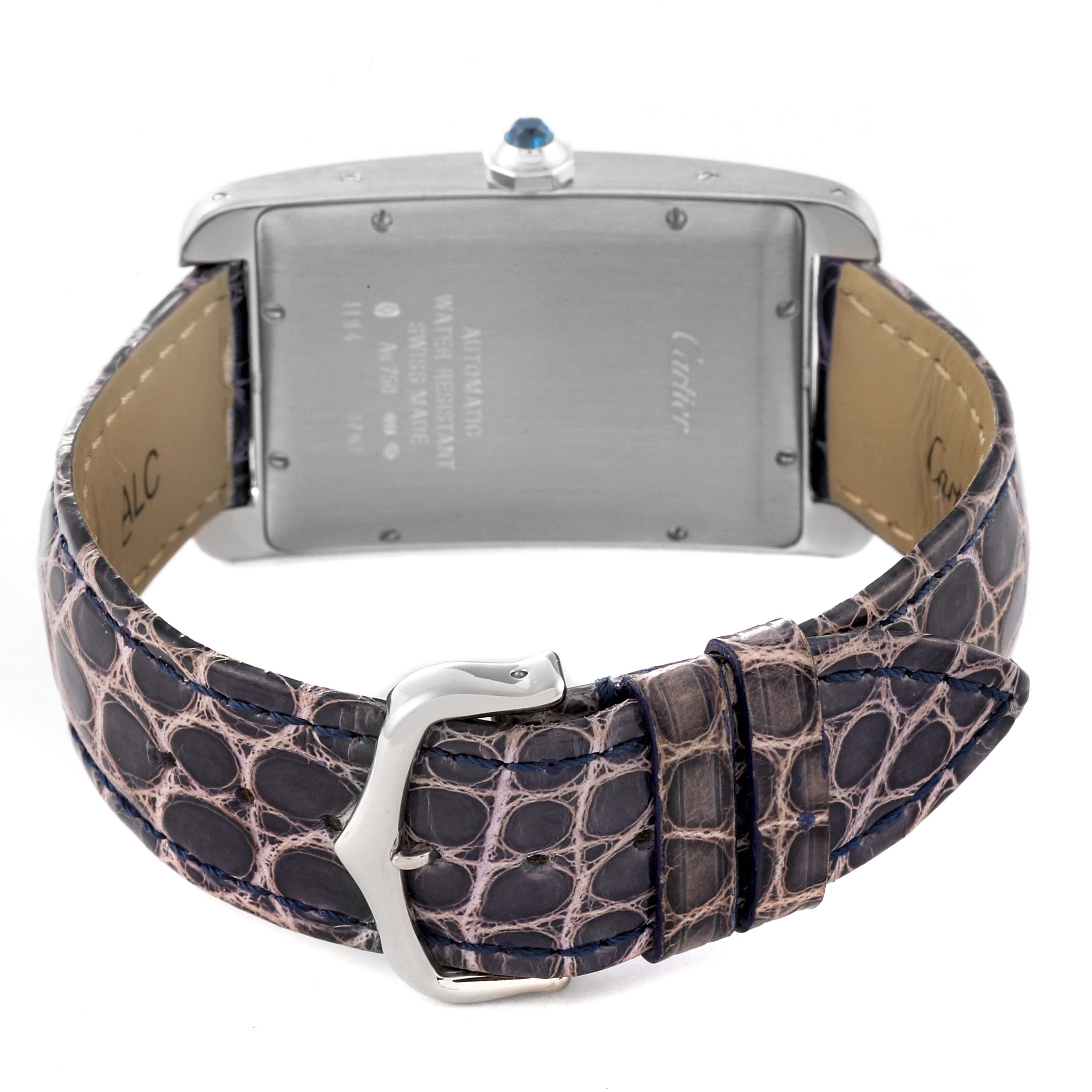 The Cartier Tank Americaine W2603256 Men's White Gold Silver Dial W2603256 Men's White Gold Silver Dial watch is shown from the back, highlighting its case back and leather strap with a buckle.