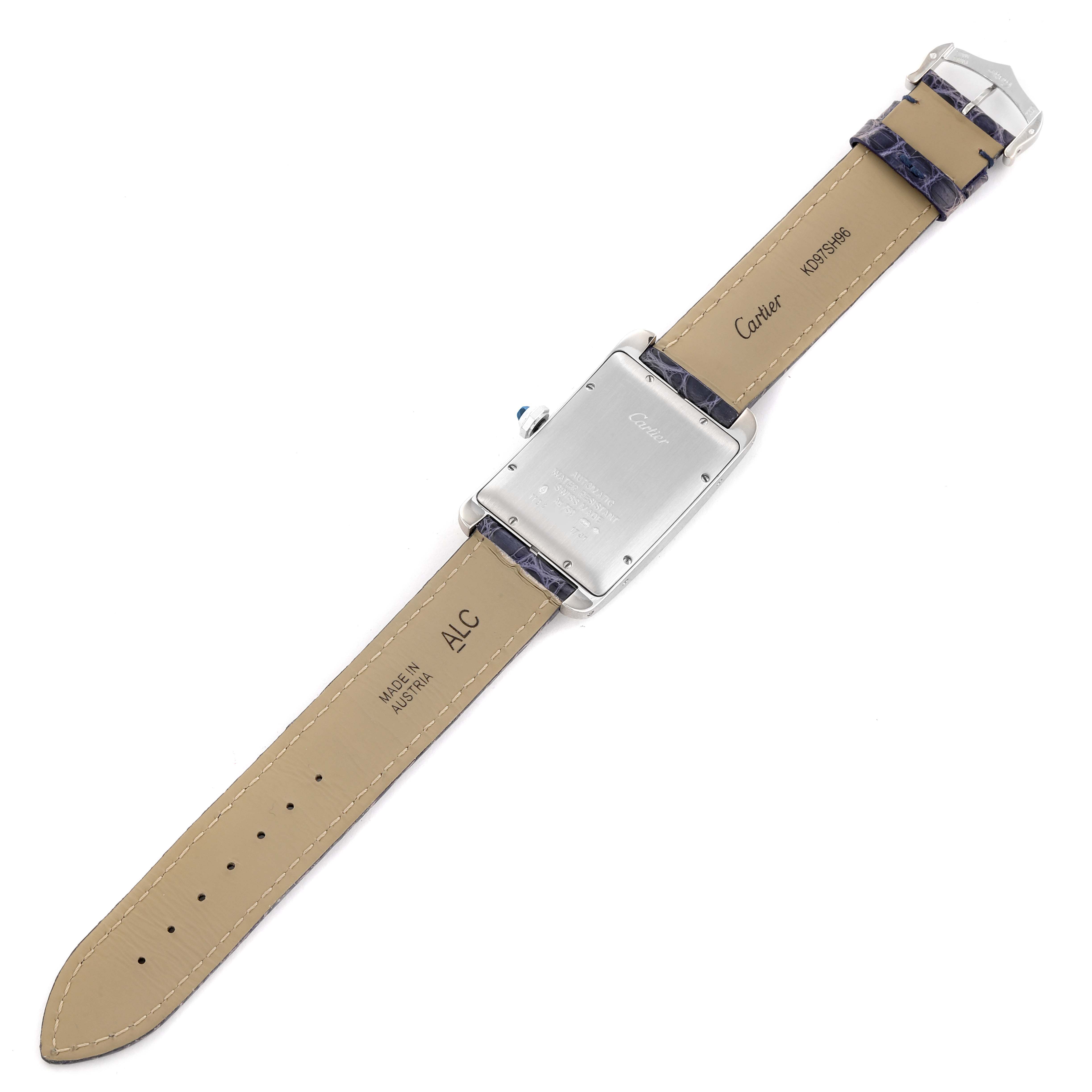 The image shows the back view of a Cartier Tank Américaine watch, highlighting the leather strap and case back details.