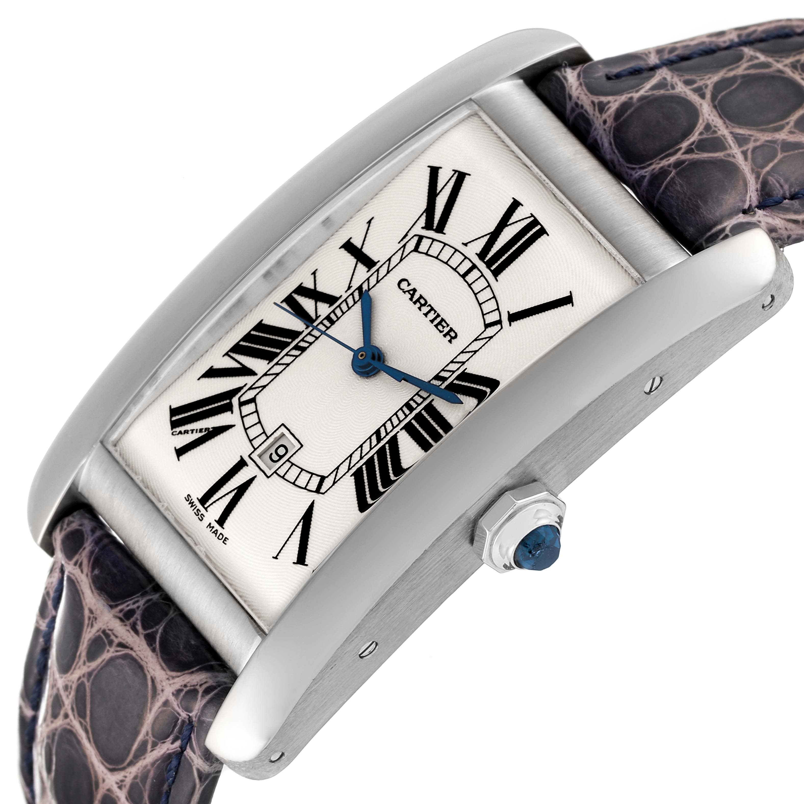 The Cartier Tank Américaine watch is shown at a slight side angle, highlighting the face, crown, and leather strap.