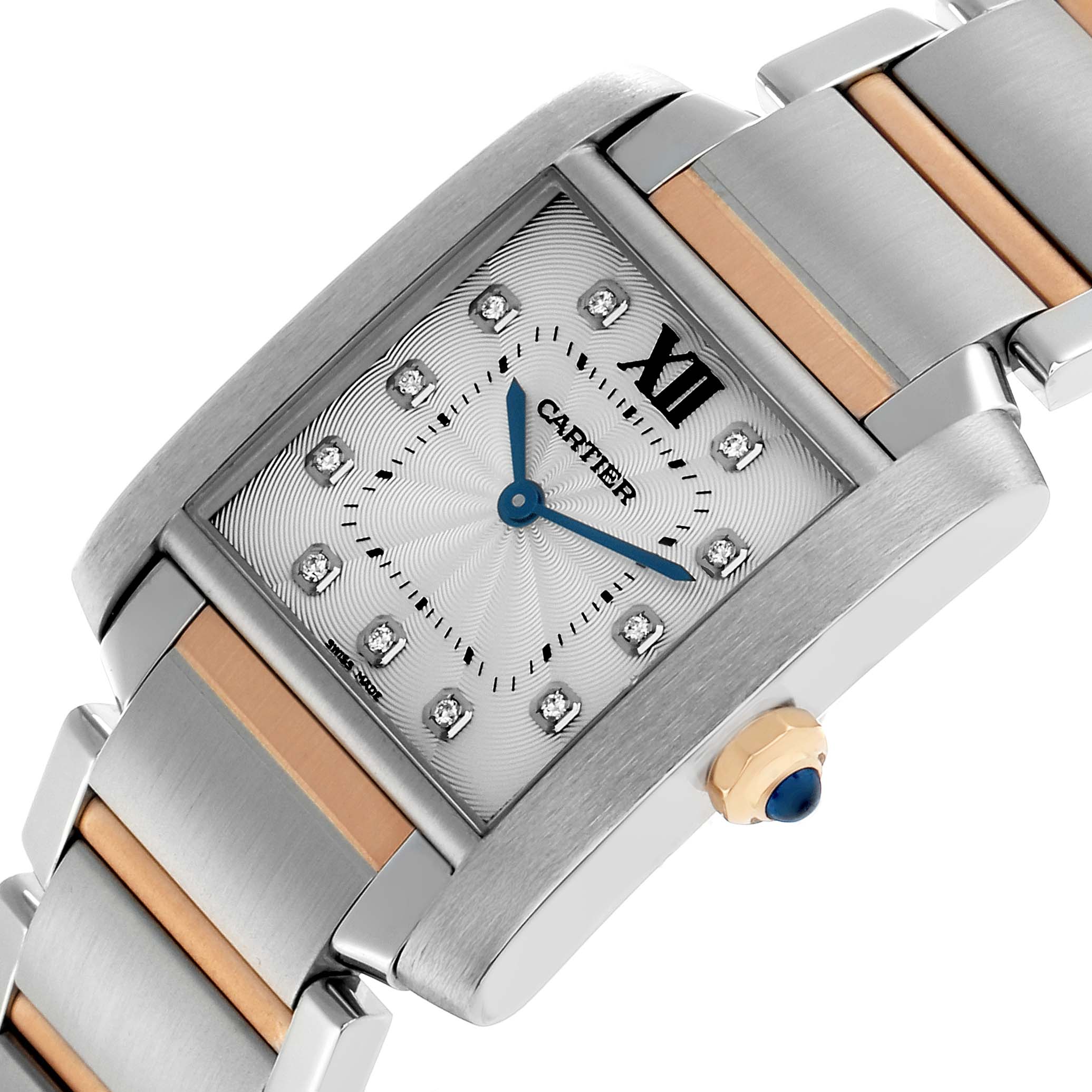 The Cartier Tank Francaise WE110005 Women's Steel and Gold (two tone) Silver Dial watch is shown at an angle highlighting the face, bracelet, and crown with a blue cabochon.