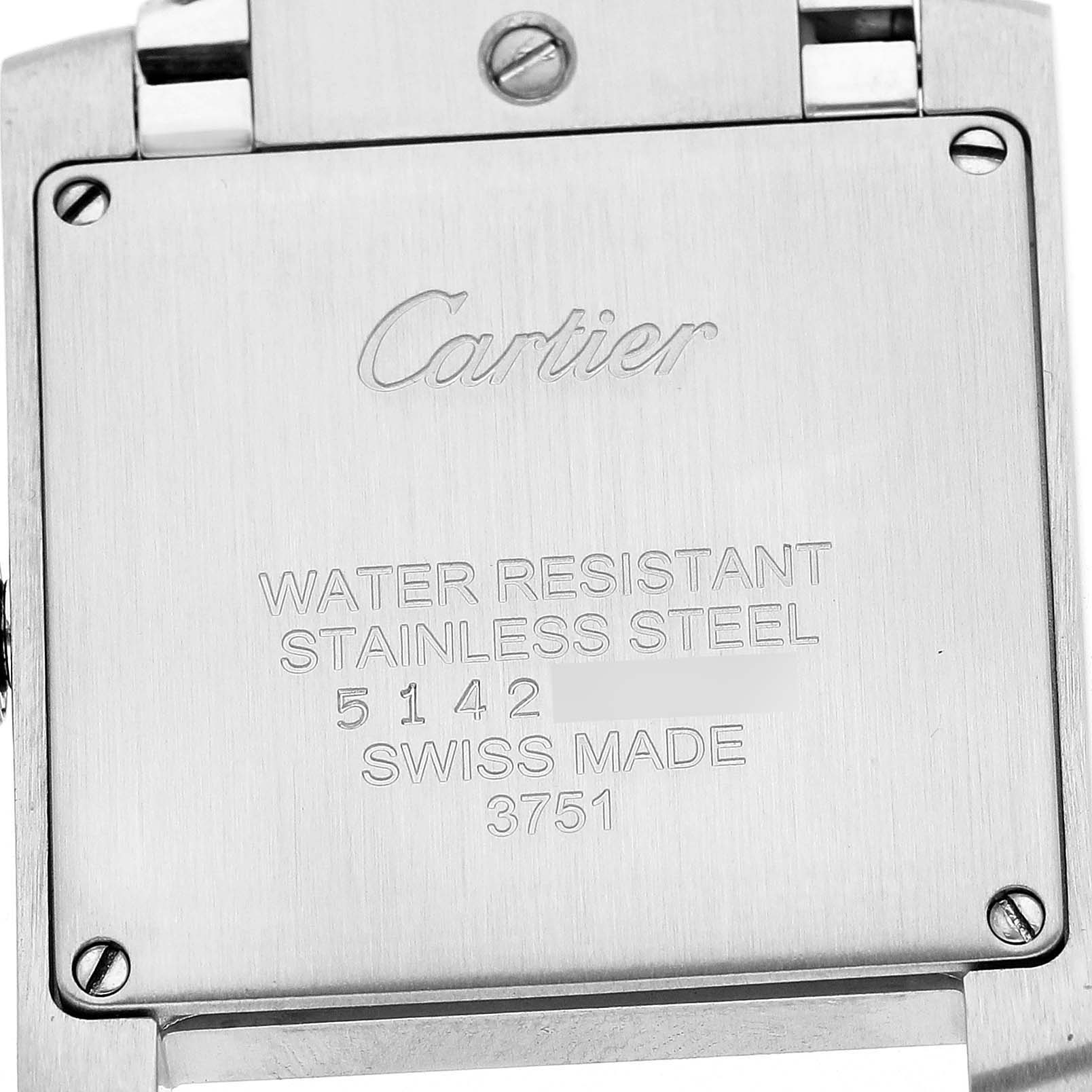 The image shows the back case of a Cartier Tank Francaise WE110005 Women's Steel and Gold (two tone) Silver Dial watch, highlighting its engraved details and stainless steel construction.