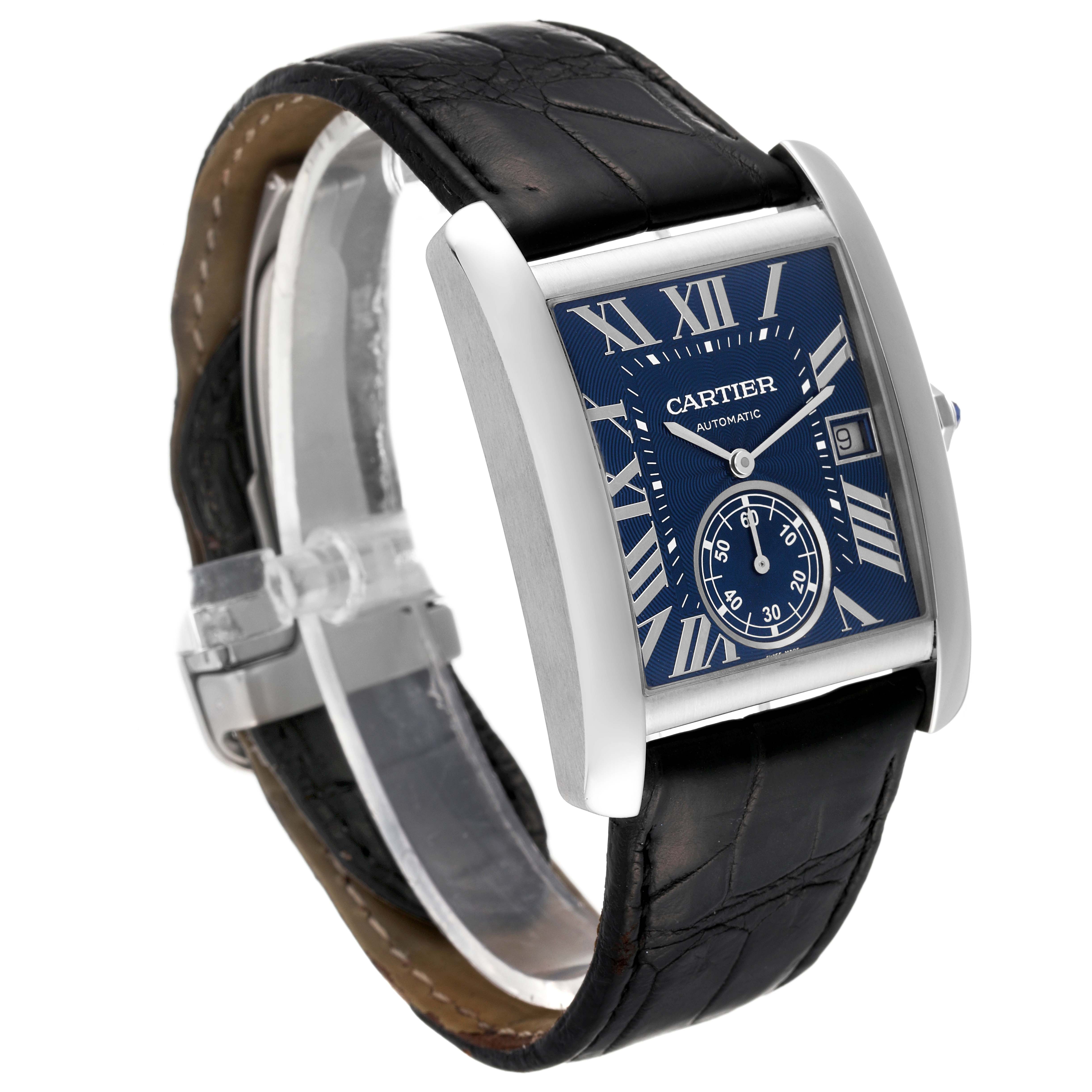 The image shows a Cartier Tank MC WSTA0010 Men's Stainless Steel Blue Dial WSTA0010 Men's Stainless Steel Blue Dial watch at a three-quarter angle, displaying its blue dial, Roman numerals, and black leather strap.
