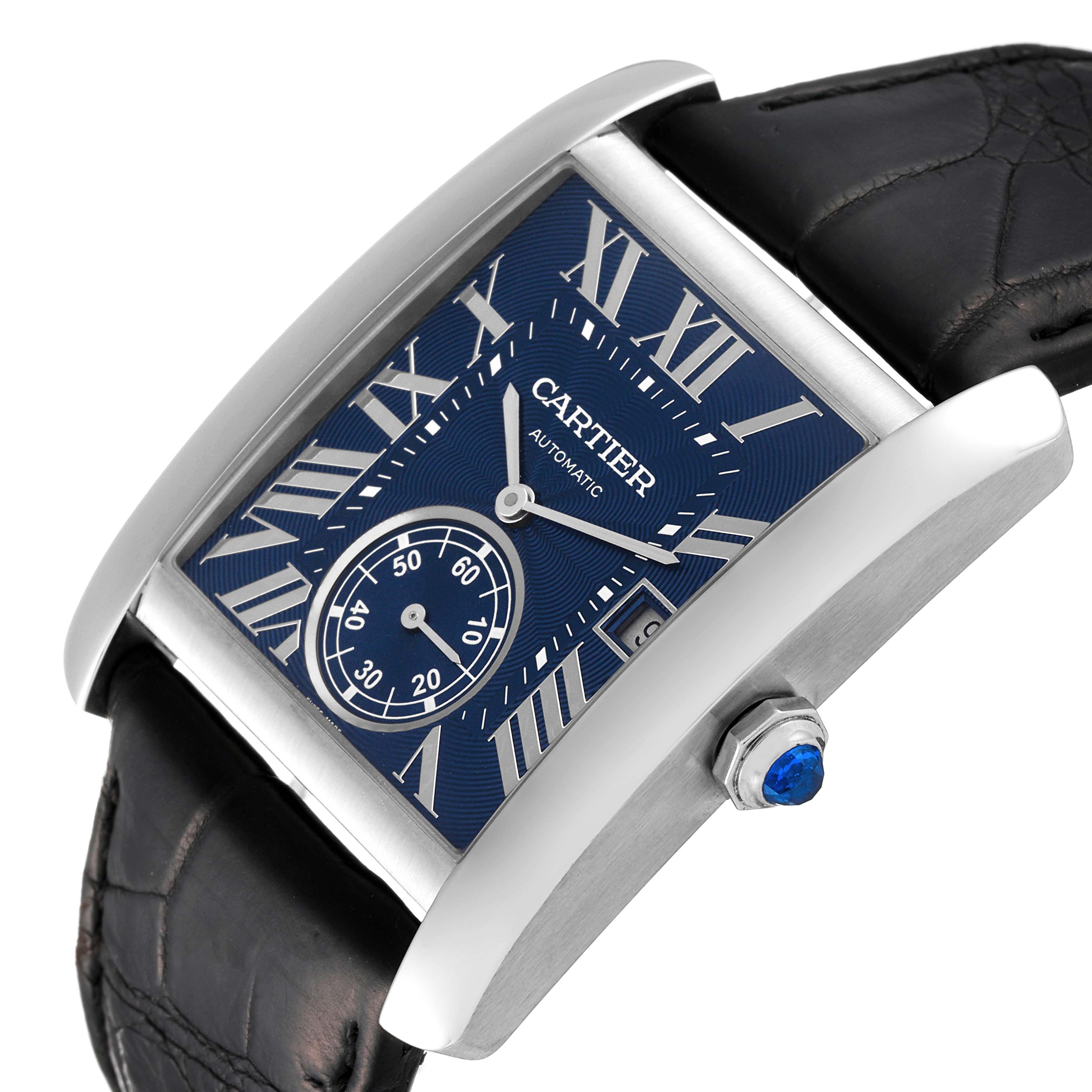 The Cartier Tank MC WSTA0010 Men's Stainless Steel Blue Dial WSTA0010 Men's Stainless Steel Blue Dial watch is shown at a slight angle, displaying its blue dial, Roman numerals, leather strap, and crown with a blue gem.