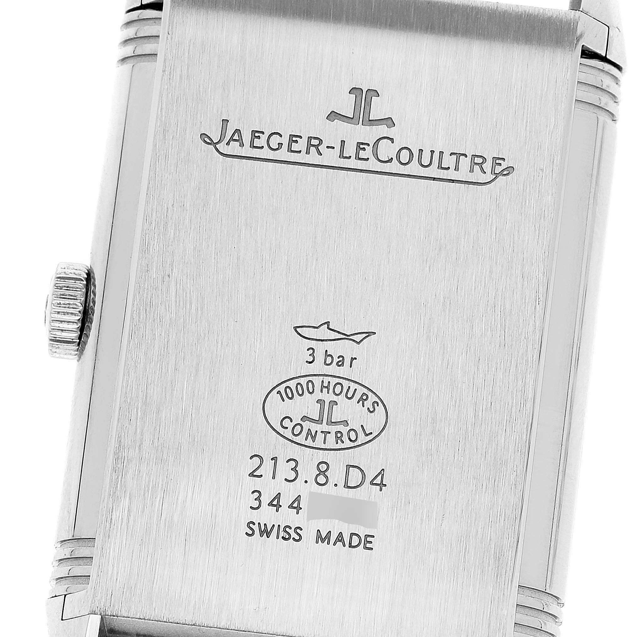 The image shows the back case of a Jaeger LeCoultre Reverso Q3848420 Men's Stainless Steel Silver Dial Q3848420 Men's Stainless Steel Silver Dial model watch, highlighting the brand engraving and specifications.