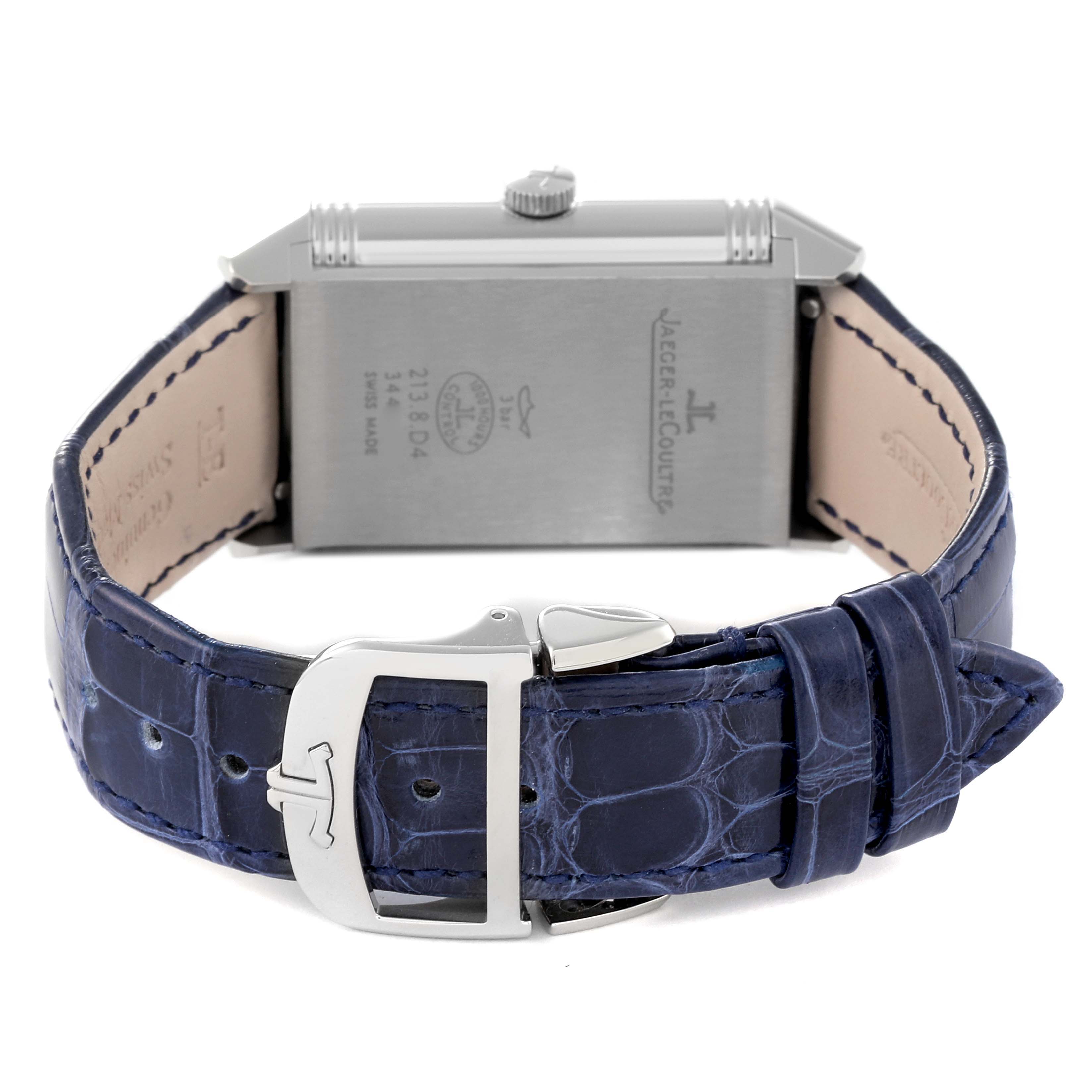 The image shows the back view of a Jaeger LeCoultre Reverso Q3848420 Men's Stainless Steel Silver Dial Q3848420 Men's Stainless Steel Silver Dial watch, focusing on the caseback and blue leather strap with a clasp.