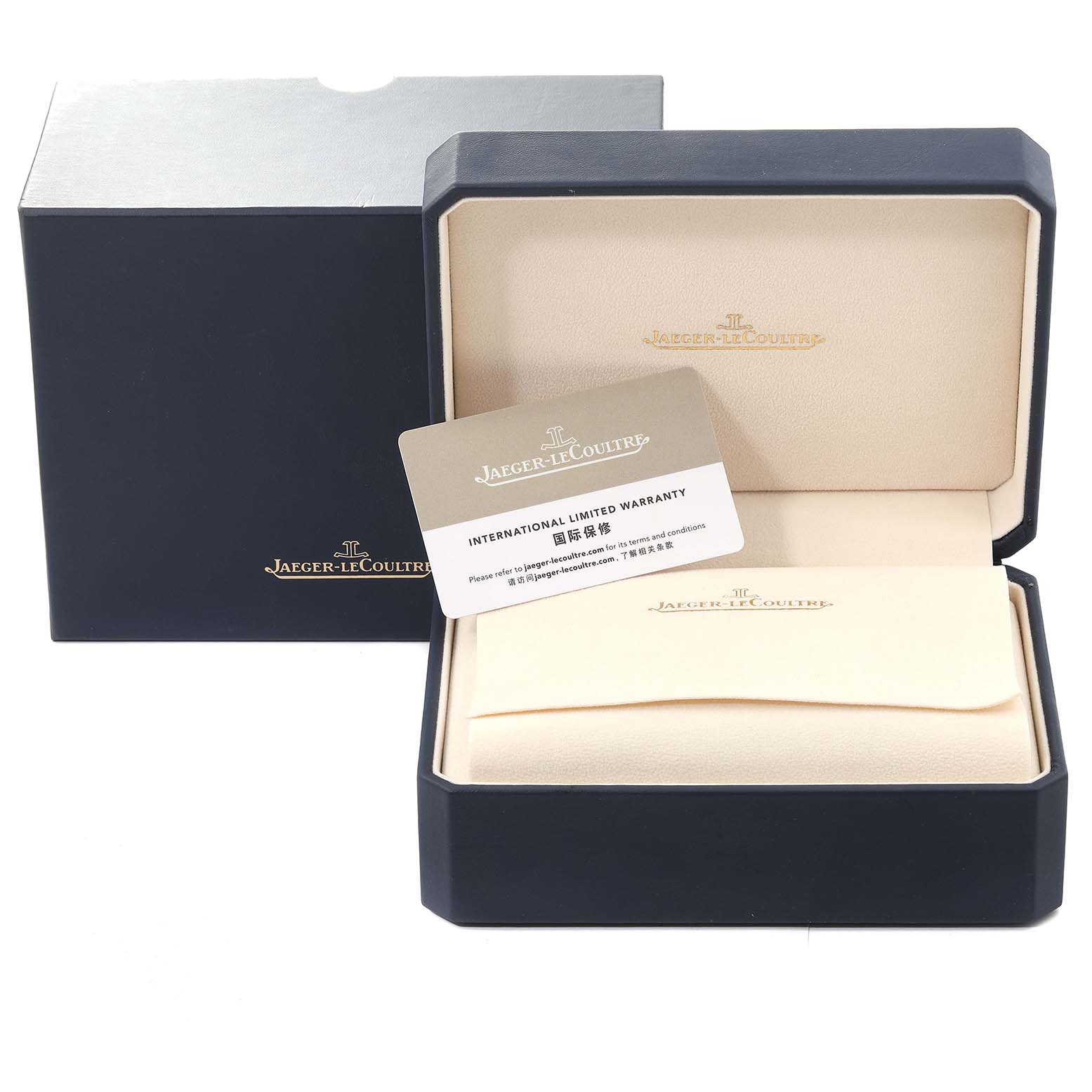The image shows the opened packaging box with a warranty card for a Jaeger-LeCoultre Reverso model watch, including an inner and outer box.