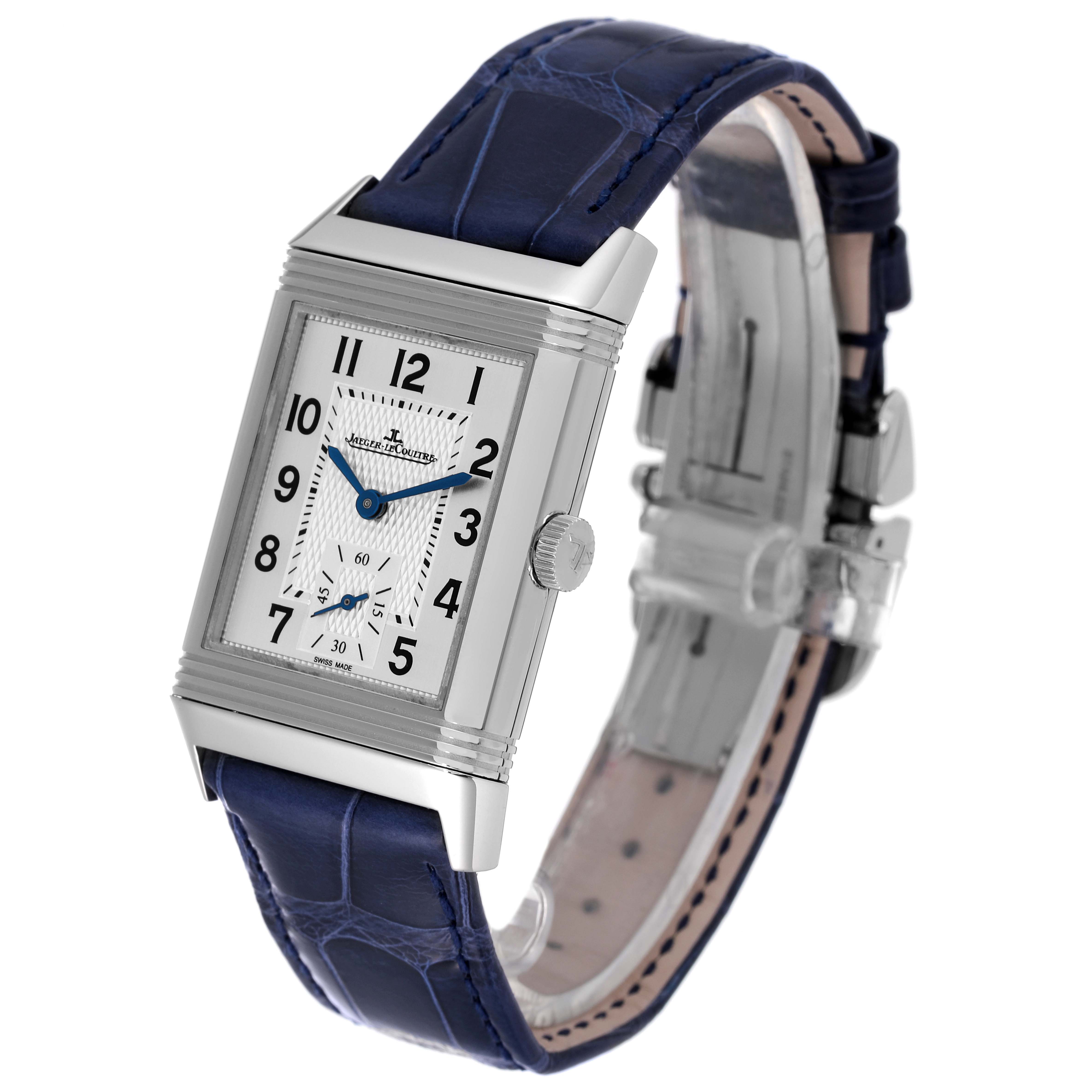 The image shows a Jaeger LeCoultre Reverso Q3848420 Men's Stainless Steel Silver Dial Q3848420 Men's Stainless Steel Silver Dial watch from a 3/4 front angle, highlighting the face, case, and blue strap.