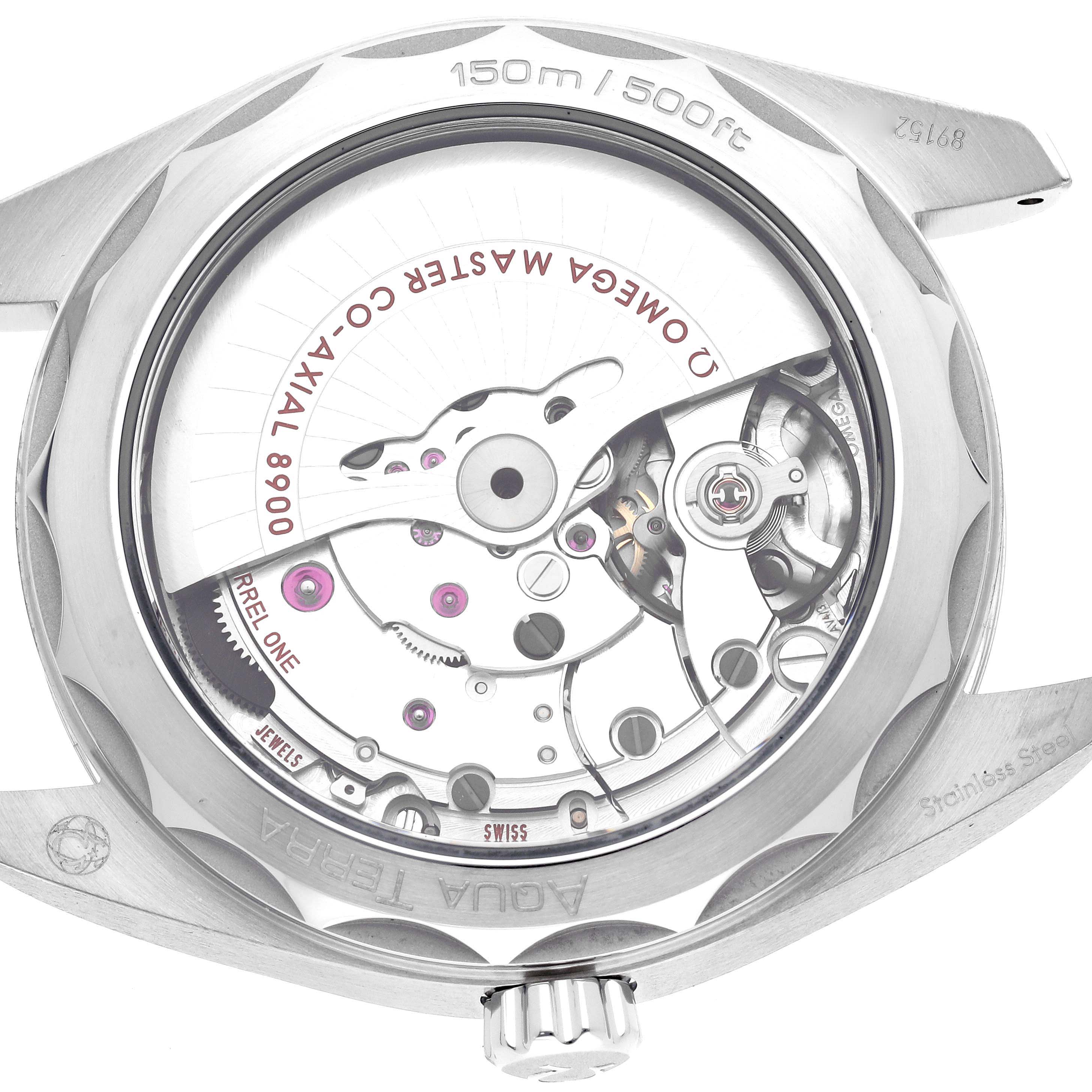 The image shows the back of the Omega Aqua Terra 220.12.41.21.03.002 Men's Stainless Steel Blue Dial 220.12.41.21.03.002 Men's Stainless Steel Blue Dial watch, highlighting its movement and engraved details.