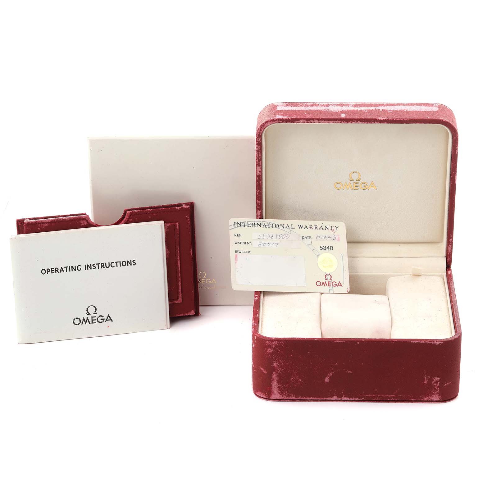 The image shows accessories for the Omega Seamaster 2536.50.00 Men
s Stainless Steel Black Dial 2536.50.00 Men
s Stainless Steel Black Dial, featuring the box, warranty card, and operating instructions.