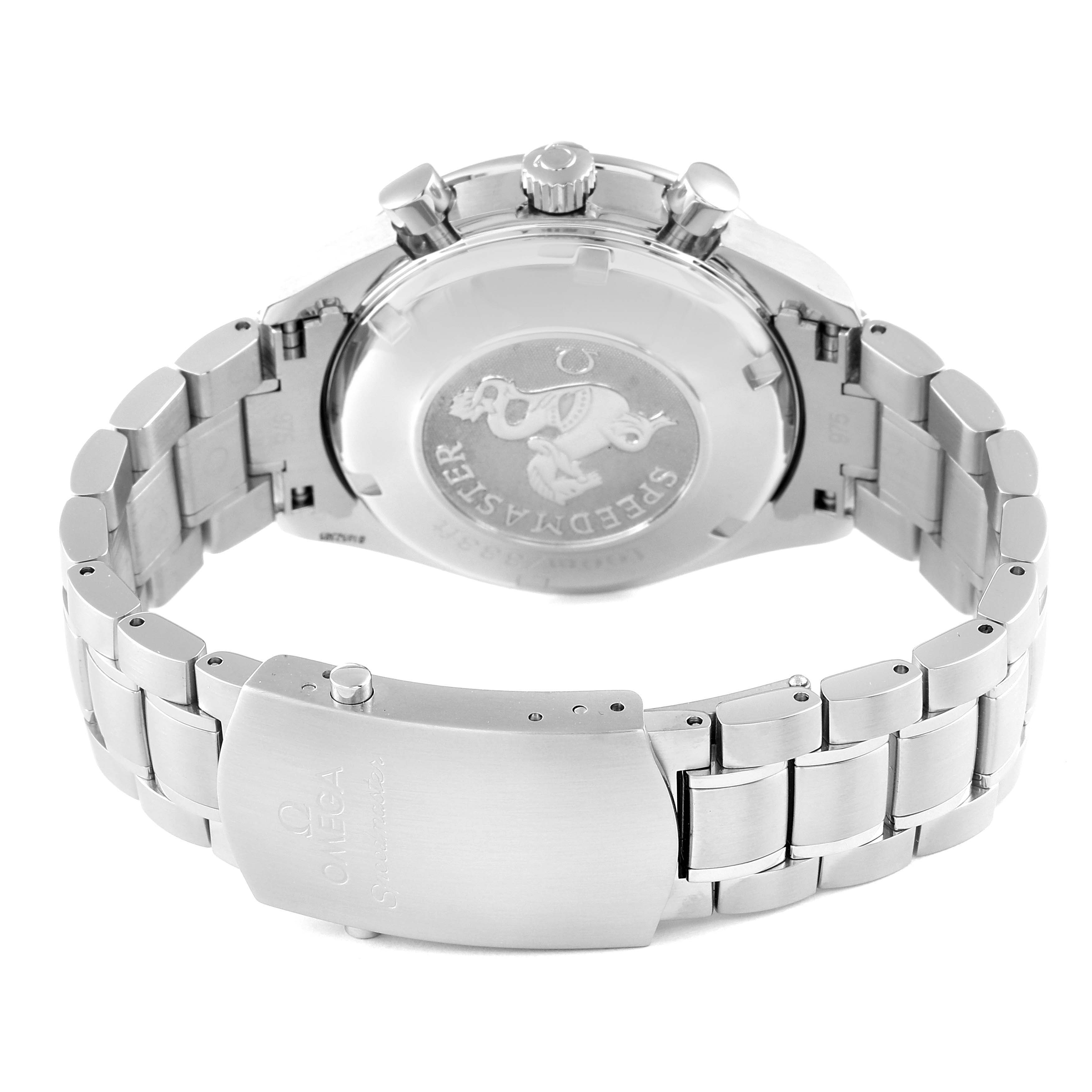 The image shows the back and clasp of the Omega Speedmaster 3210.51.00 Men's Stainless Steel Black Dial 3210.51.00 Men's Stainless Steel Black Dial watch, highlighting the engraved case back, bracelet, and push-button clasp.