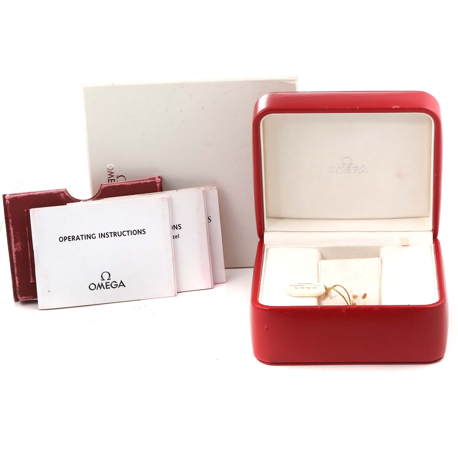 The image shows an Omega Speedmaster 3523.80.00 Men
s Stainless Steel Blue Dial 3523.80.00 Men
s Stainless Steel Blue Dial watch box with accompanying operating instructions and other manuals.