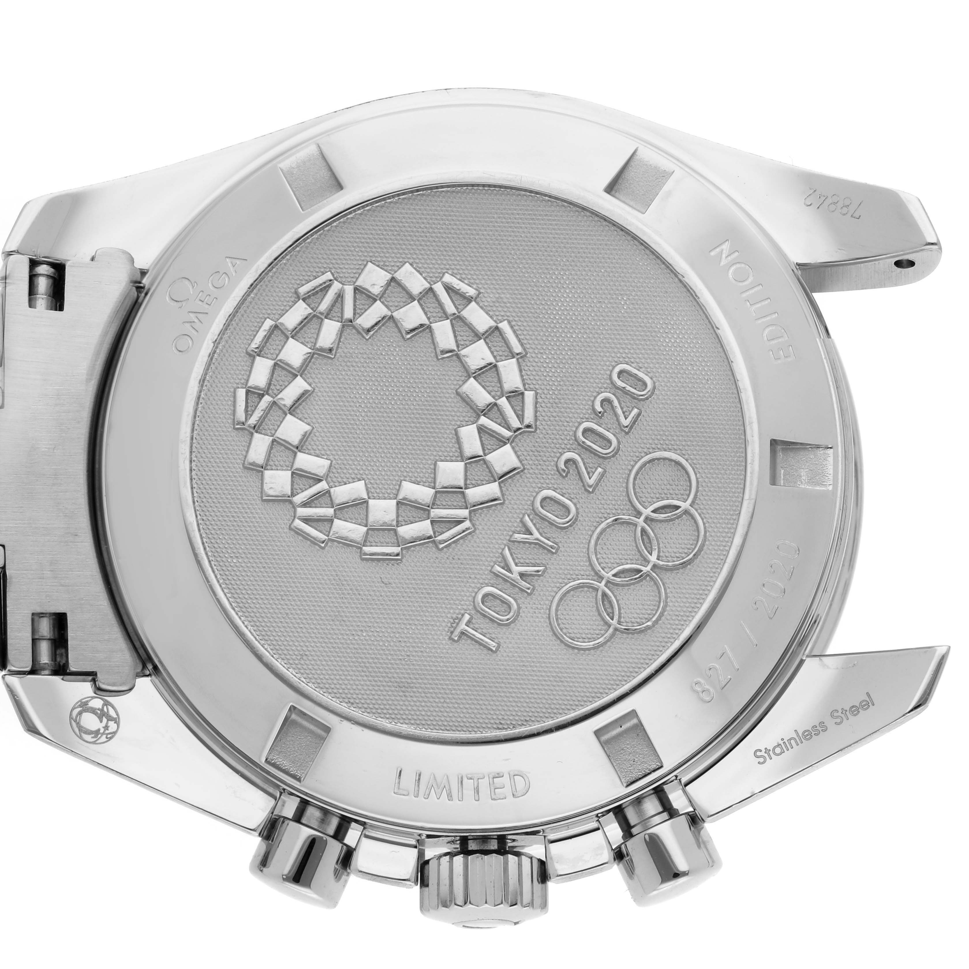 The image shows the back case of an Omega Speedmaster 522.30.42.30.06.001 Men's Stainless Steel Silver Dial 522.30.42.30.06.001 Men's Stainless Steel Silver Dial, highlighting the "Tokyo 2020" engraving and Olympian symbols.