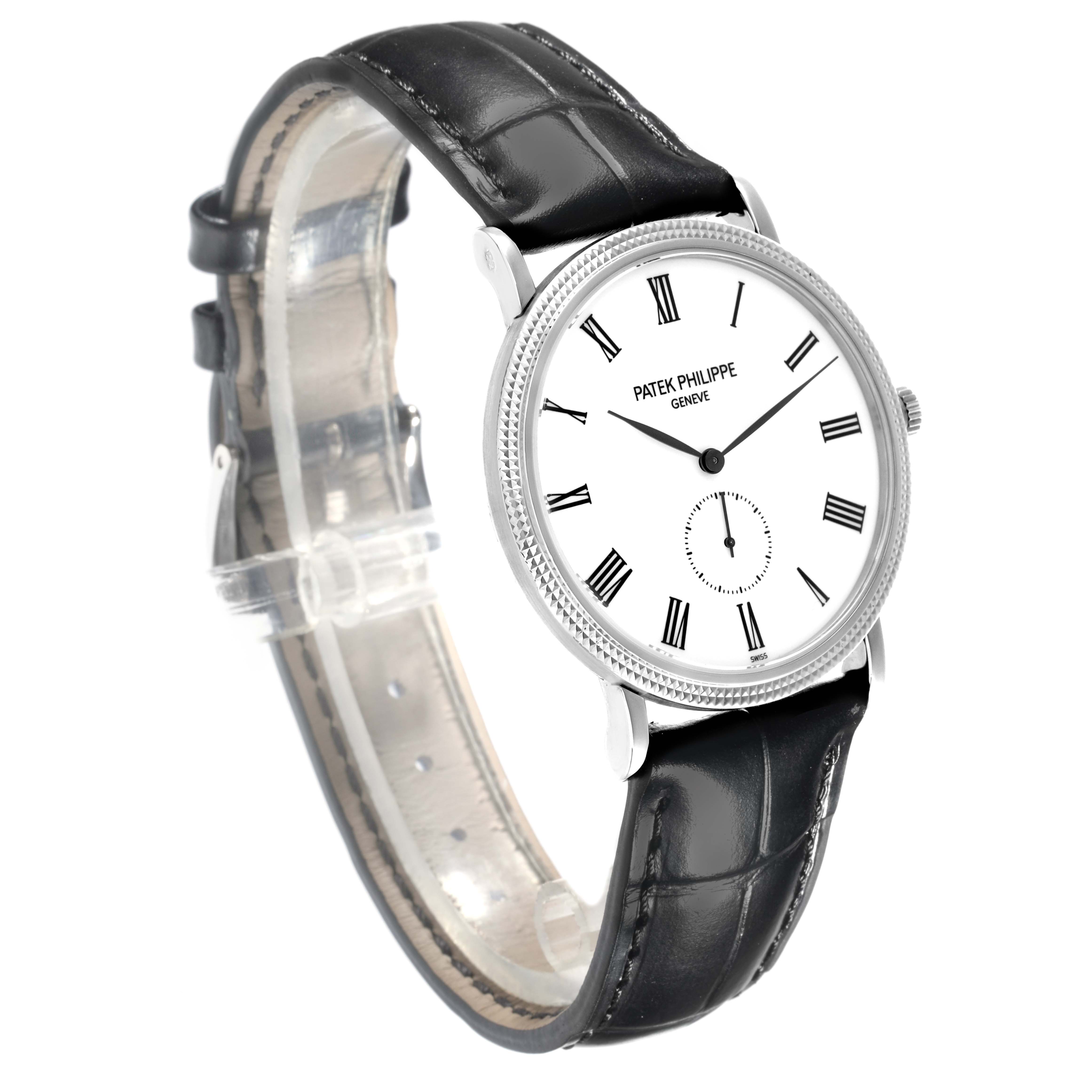 The Patek Philippe Calatrava 5119G-001 Men
s White Gold White Dial 5119G-001 Men
s White Gold White Dial watch is shown at a three-quarter angle, highlighting the face, Roman numerals, and black leather strap.