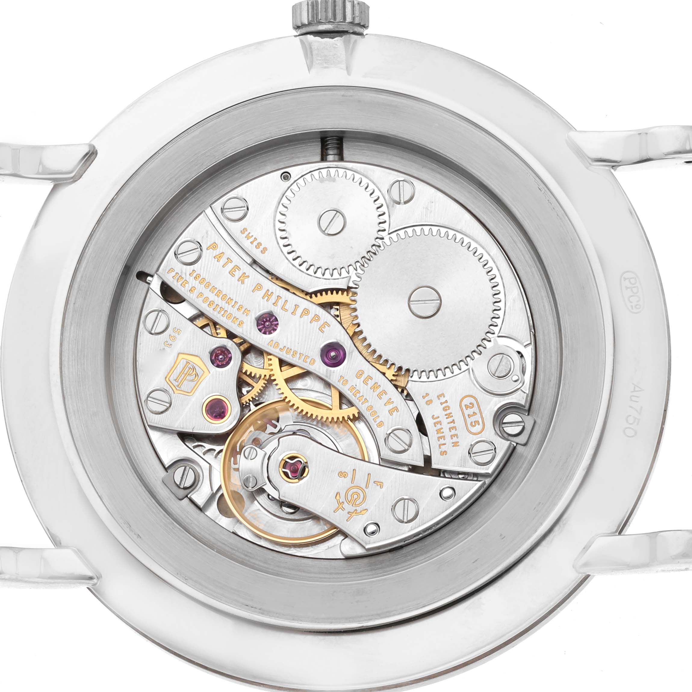 The image shows the back view of a Patek Philippe Calatrava 5119G-001 Men
s White Gold White Dial 5119G-001 Men
s White Gold White Dial, highlighting the intricate mechanical movement.