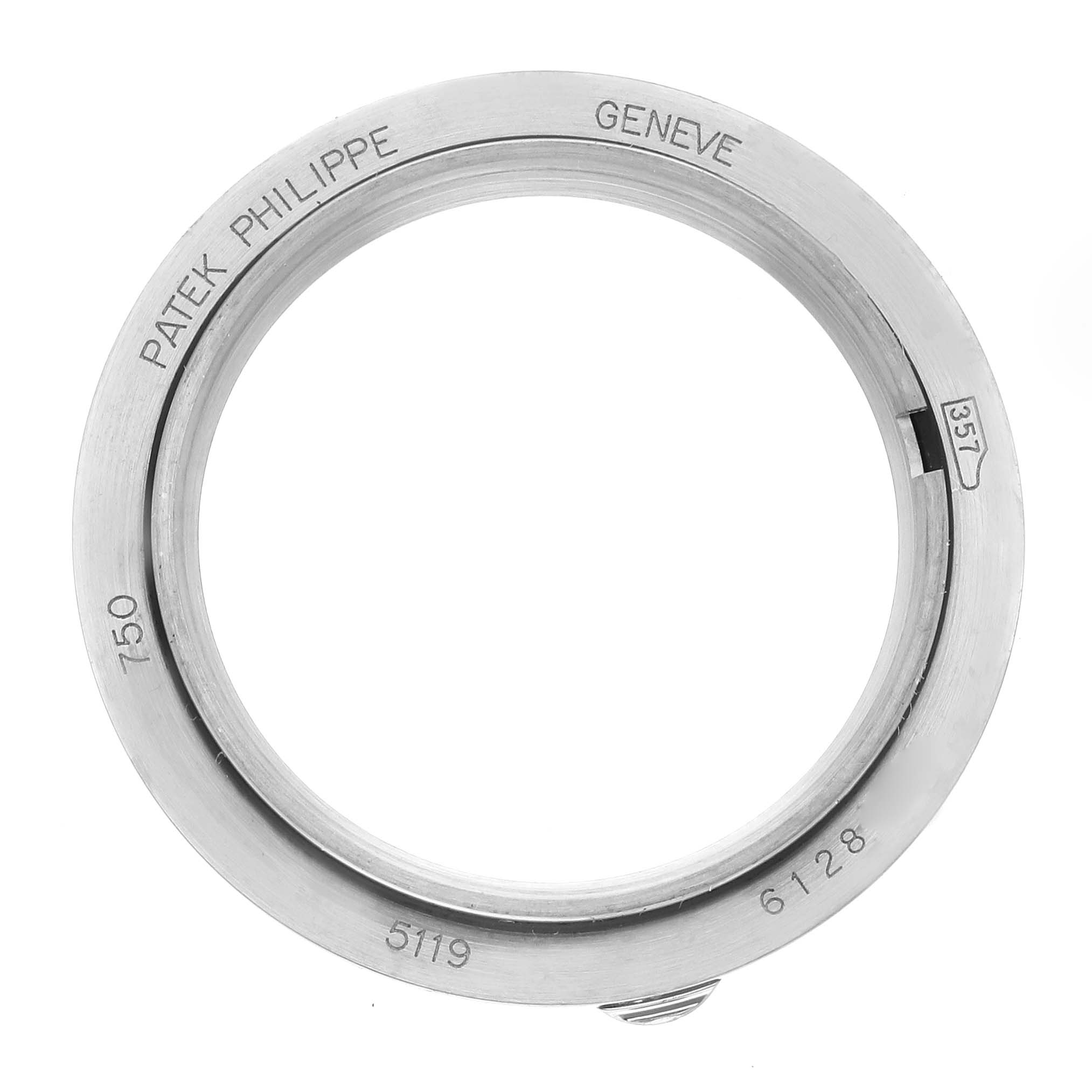 The image shows the bezel part of a Patek Philippe Calatrava 5119G-001 Men
s White Gold White Dial 5119G-001 Men
s White Gold White Dial watch, viewed from the top.