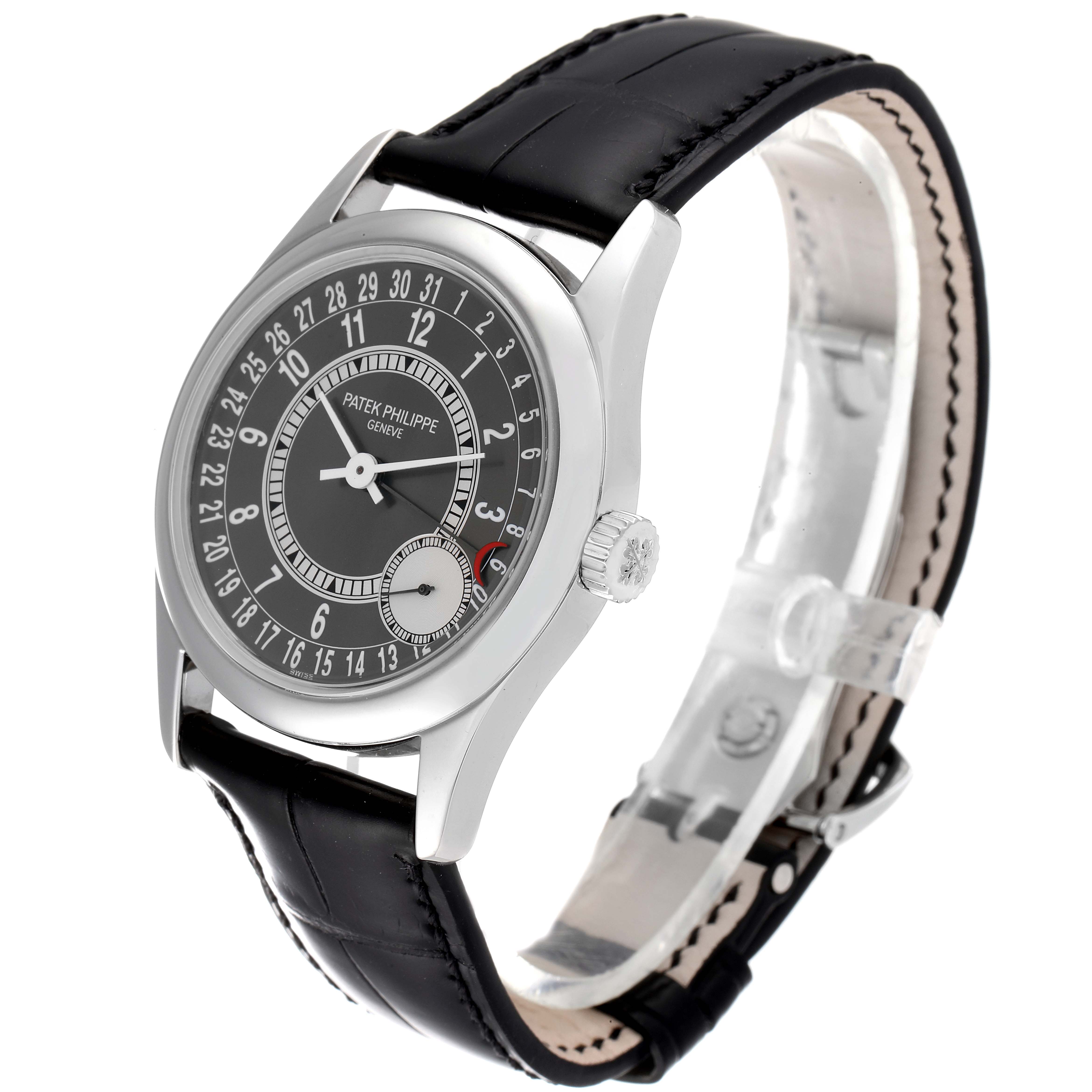 The Patek Philippe Calatrava 6000G Men's White Gold Grey Dial 6000G Men's White Gold Grey Dial watch is shown at an angled view, highlighting its face, crown, and black leather strap.