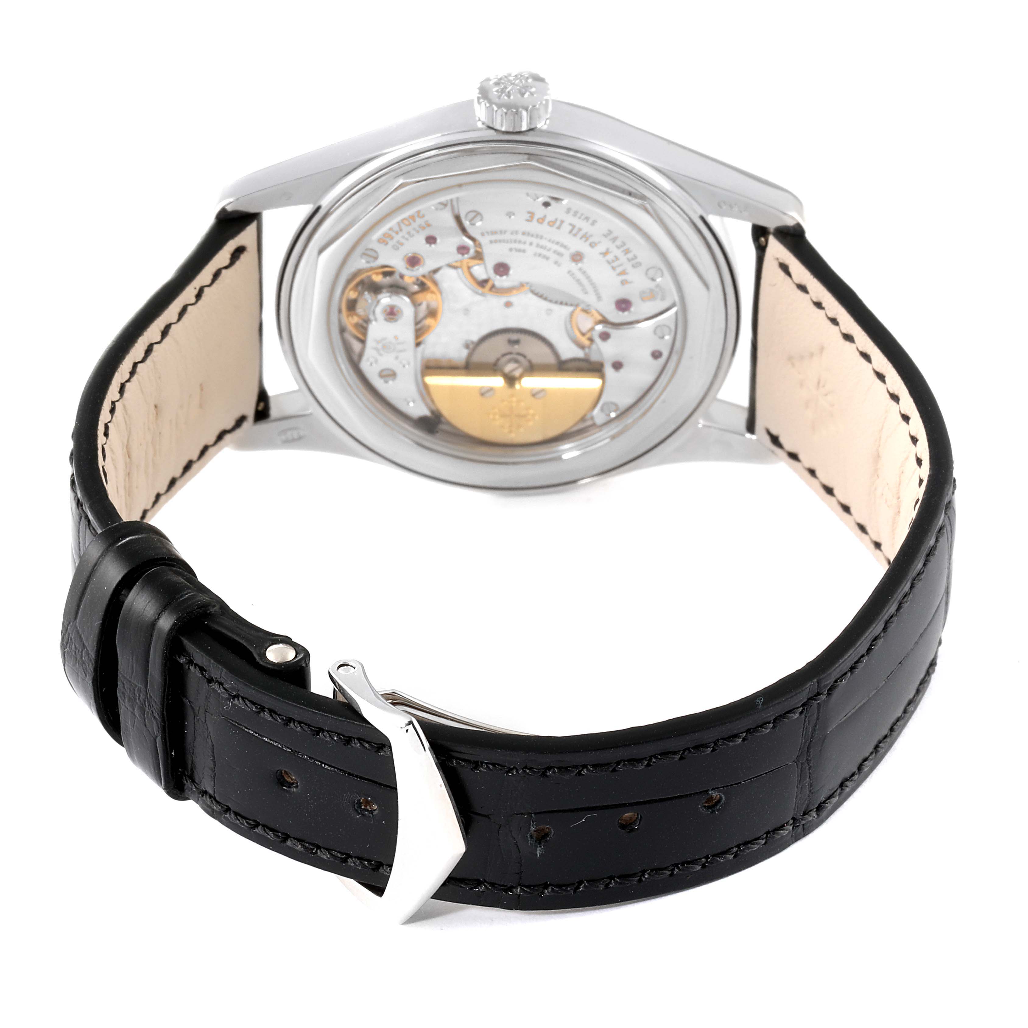 The image shows the rear view of a Patek Philippe Calatrava 6000G Men's White Gold Grey Dial 6000G Men's White Gold Grey Dial watch, highlighting its transparent case back and black leather strap.