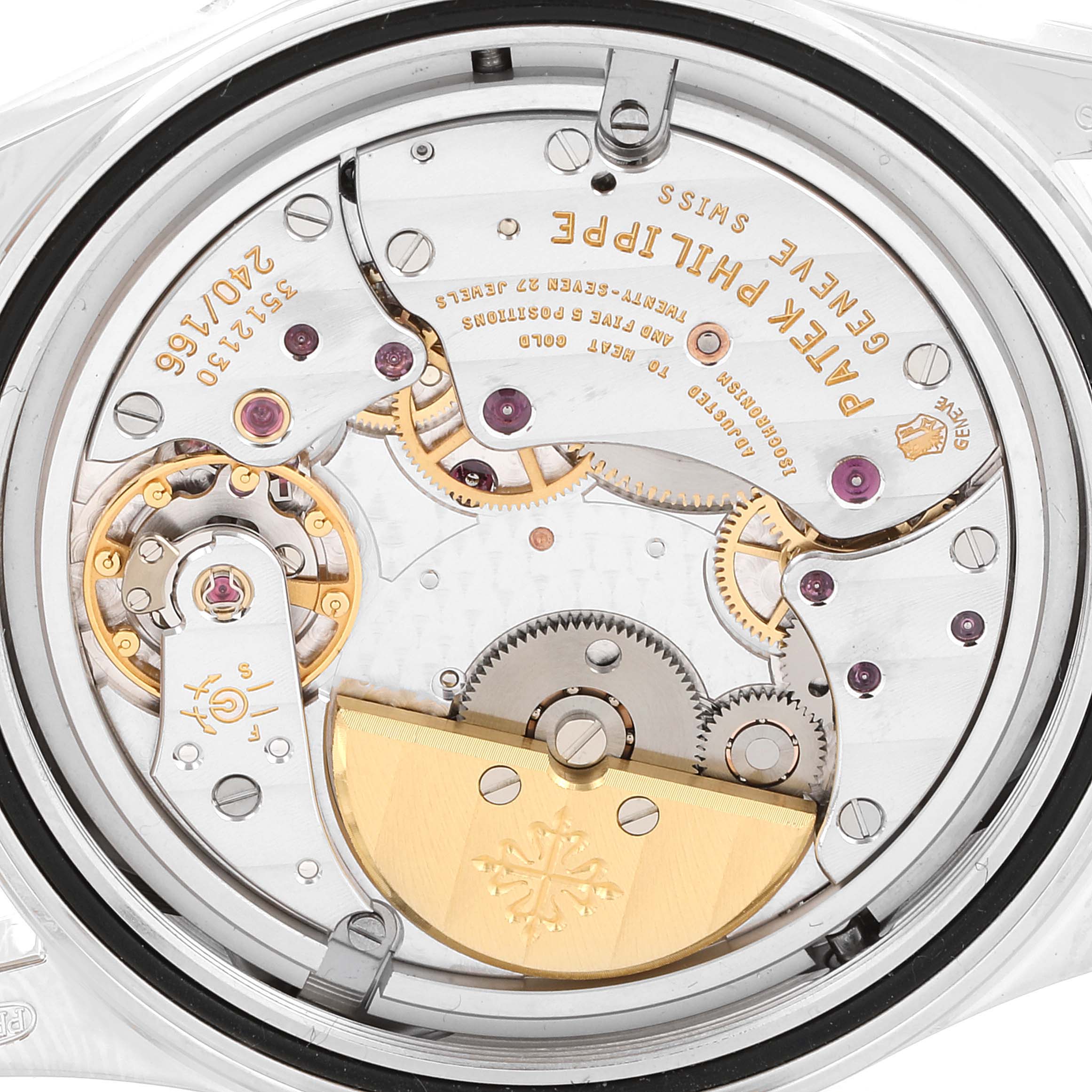 This is a close-up view of the movement of a Patek Philippe Calatrava 6000G Men's White Gold Grey Dial 6000G Men's White Gold Grey Dial watch, showcasing the intricate inner workings.