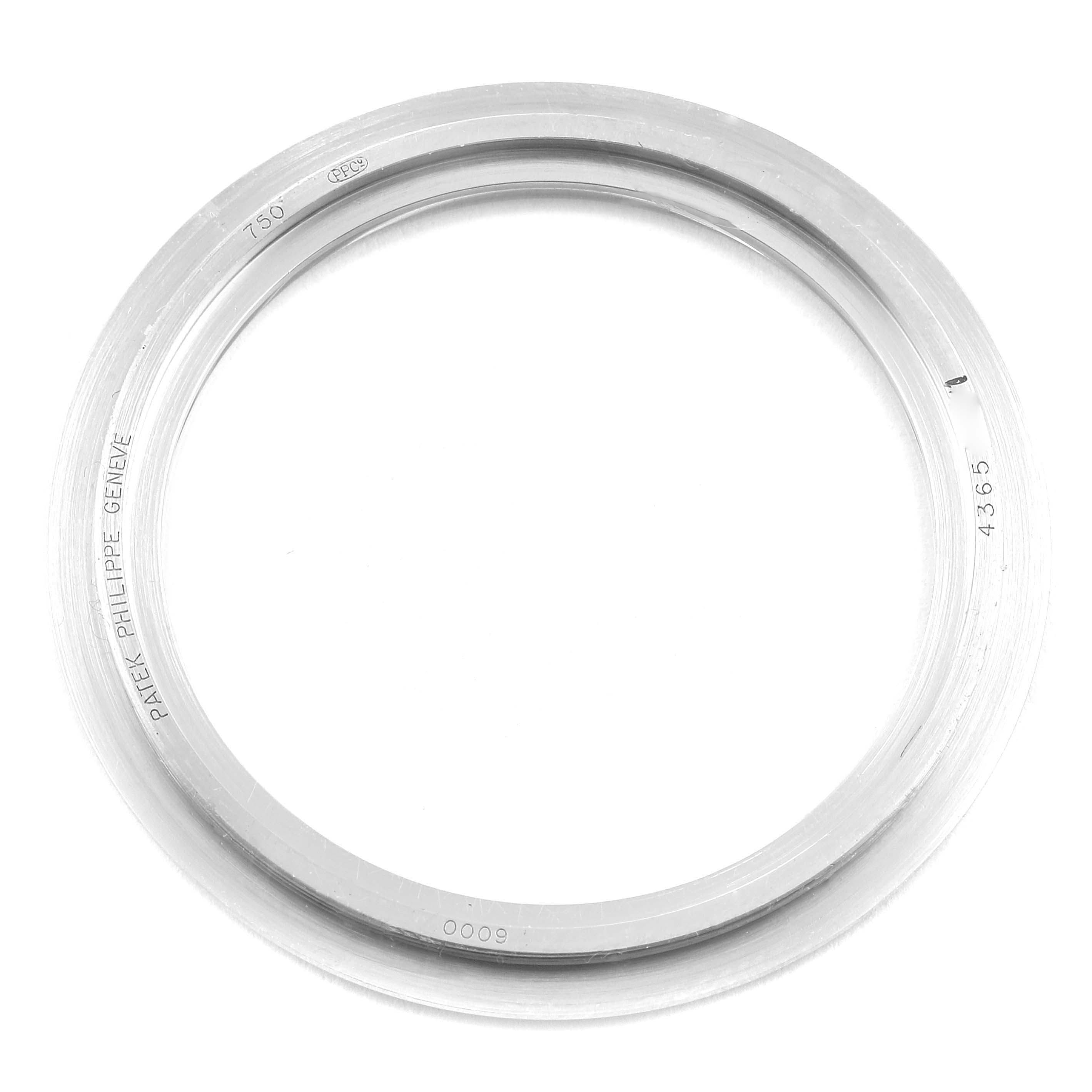 This image shows a close-up of the bezel of a Patek Philippe Calatrava 6000G Men's White Gold Grey Dial 6000G Men's White Gold Grey Dial watch.