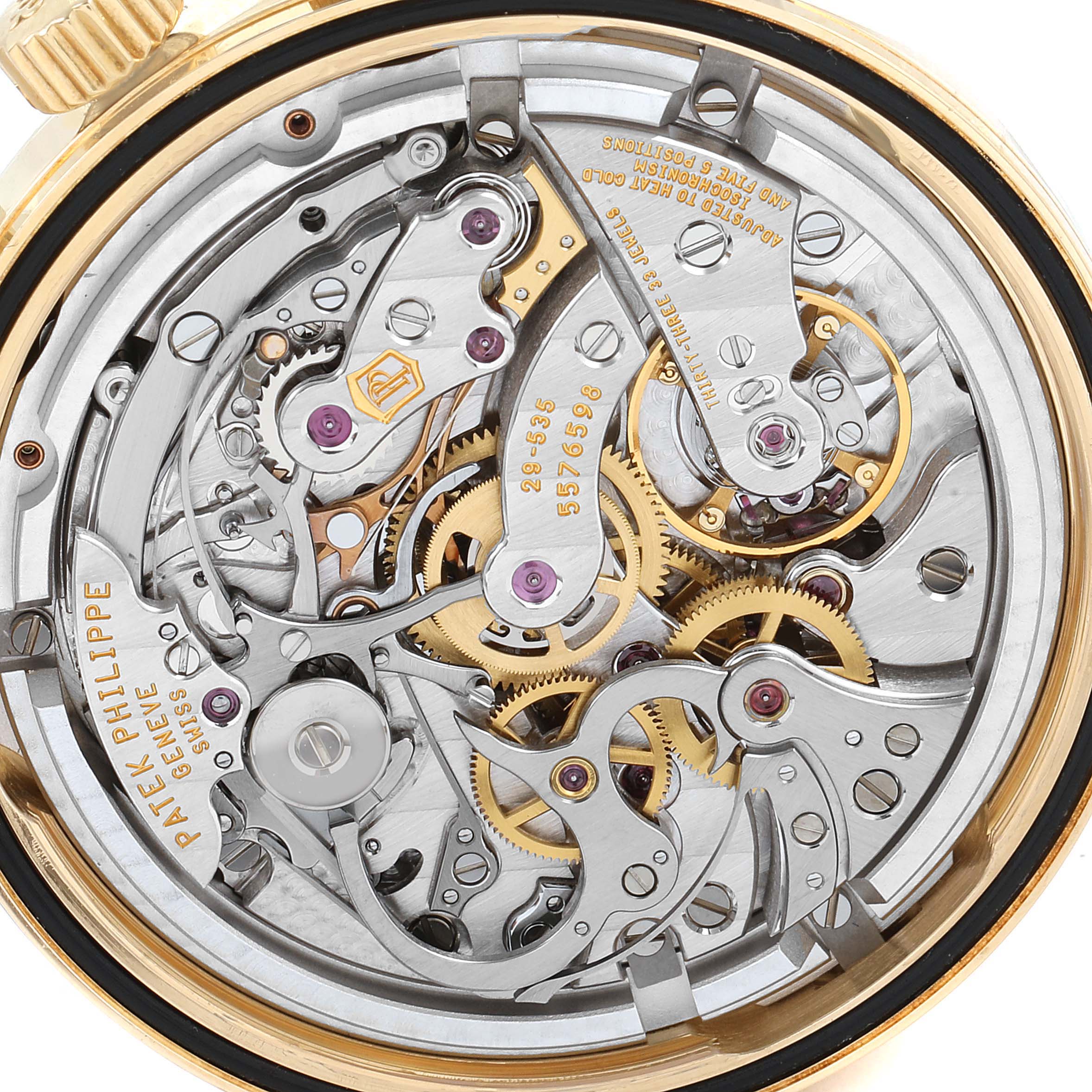 The image shows the intricate movement and inner mechanisms of a Patek Philippe Complications 5170J Men's Yellow Gold Silver Dial 5170J Men's Yellow Gold Silver Dial model watch from a back angle.