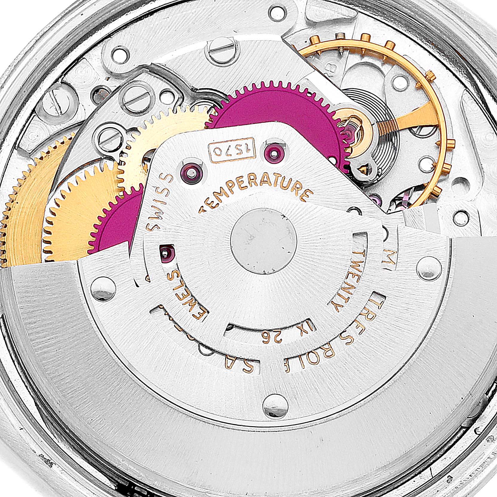 This close-up image shows the intricate mechanical movement of a Rolex Date 1500 Men
s Stainless Steel Silver Dial 1500 Men
s Stainless Steel Silver Dial watch model, highlighting gears and components.