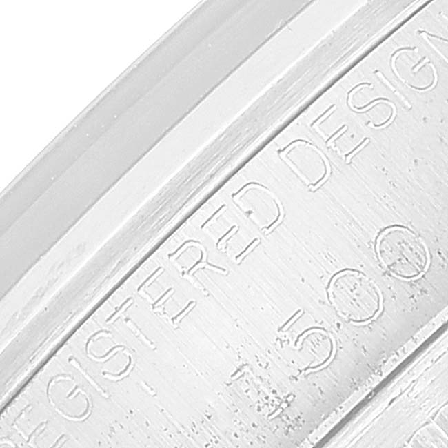 This is a close-up of the engraved inner bezel of a Rolex Date 1500 Men
s Stainless Steel Silver Dial 1500 Men
s Stainless Steel Silver Dial model watch.