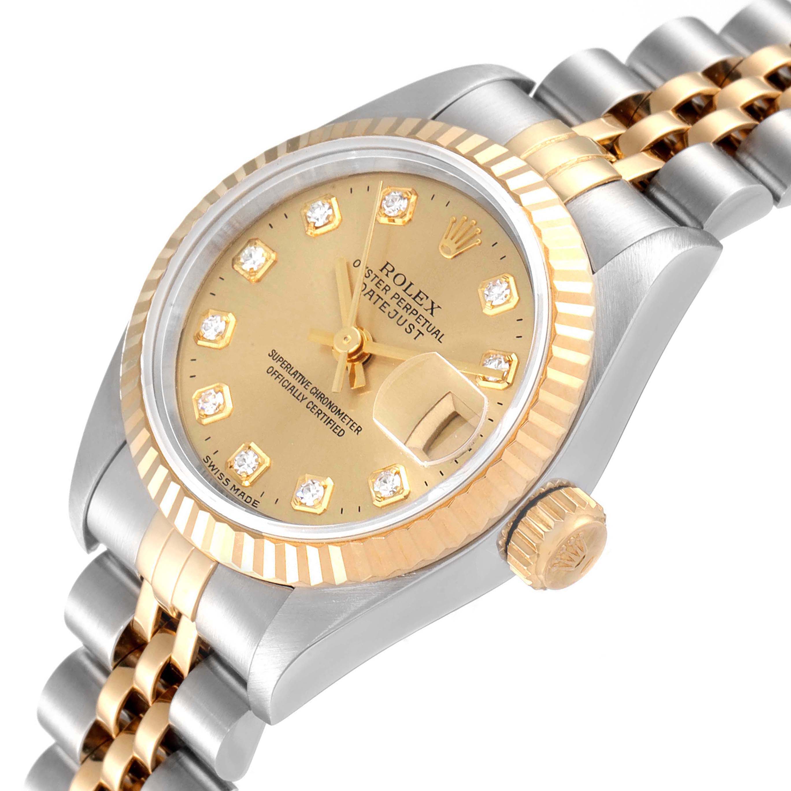 This image shows a close-up view of a Rolex Datejust 69173 Women
s Steel and Gold (two tone) Champagne Dial 69173 Women
s Steel and Gold (two tone) Champagne Dial watch, highlighting its dial, bezel, and bracelet.
