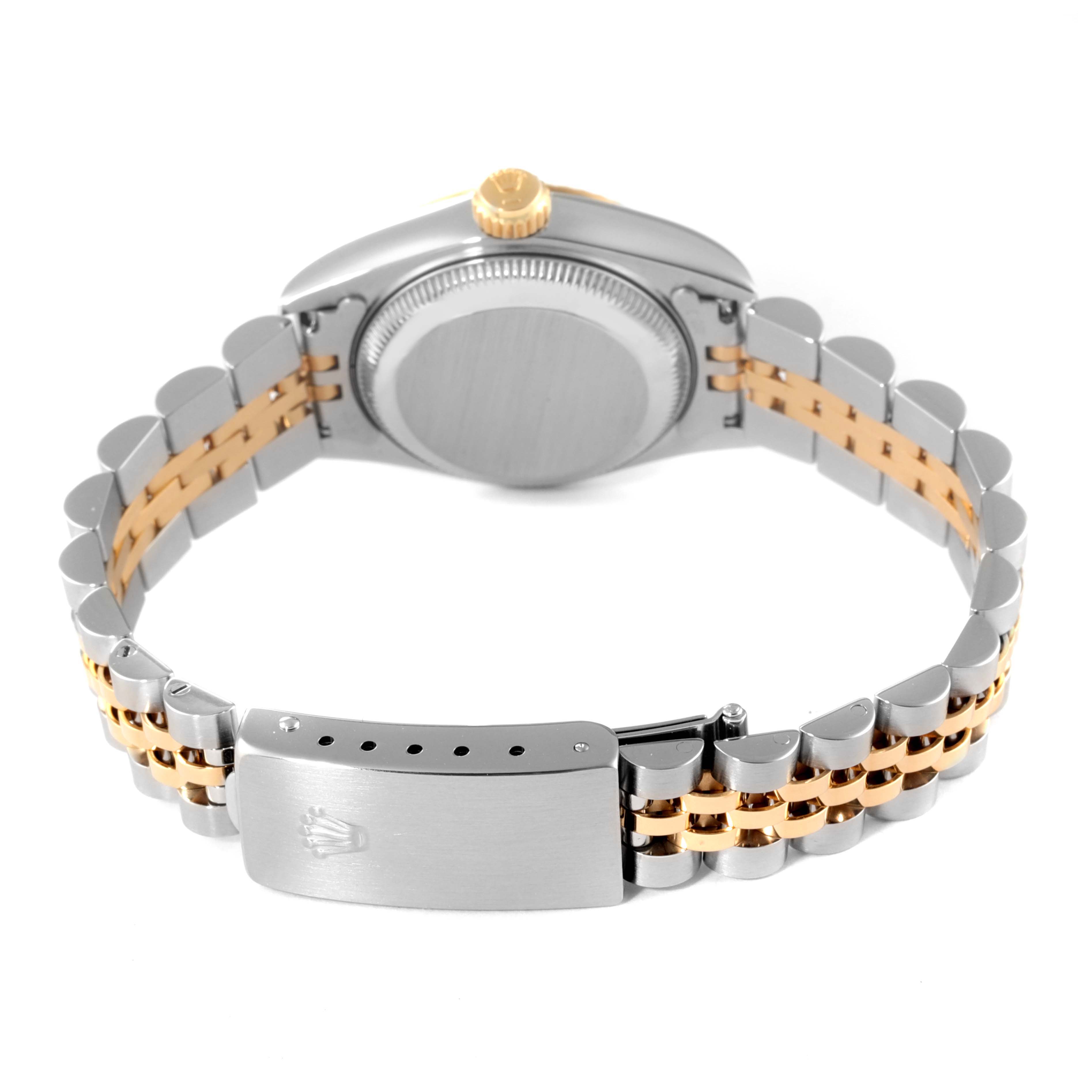 The image shows the back view of a Rolex Datejust 69173 Women
s Steel and Gold (two tone) Champagne Dial 69173 Women
s Steel and Gold (two tone) Champagne Dial watch, highlighting the case back and the two-tone bracelet with a clasp.