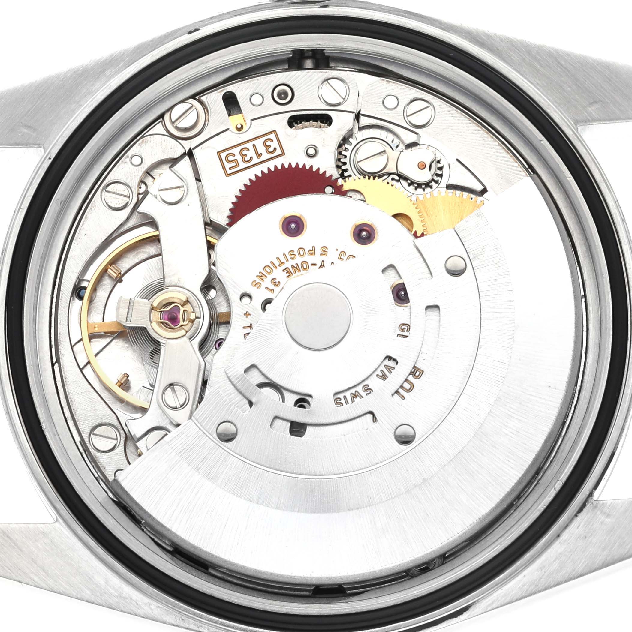 The image shows the back view of a Rolex Datejust 16200 Men
s Stainless Steel Black Dial 16200 Men
s Stainless Steel Black Dial, highlighting the movement and internal mechanisms.