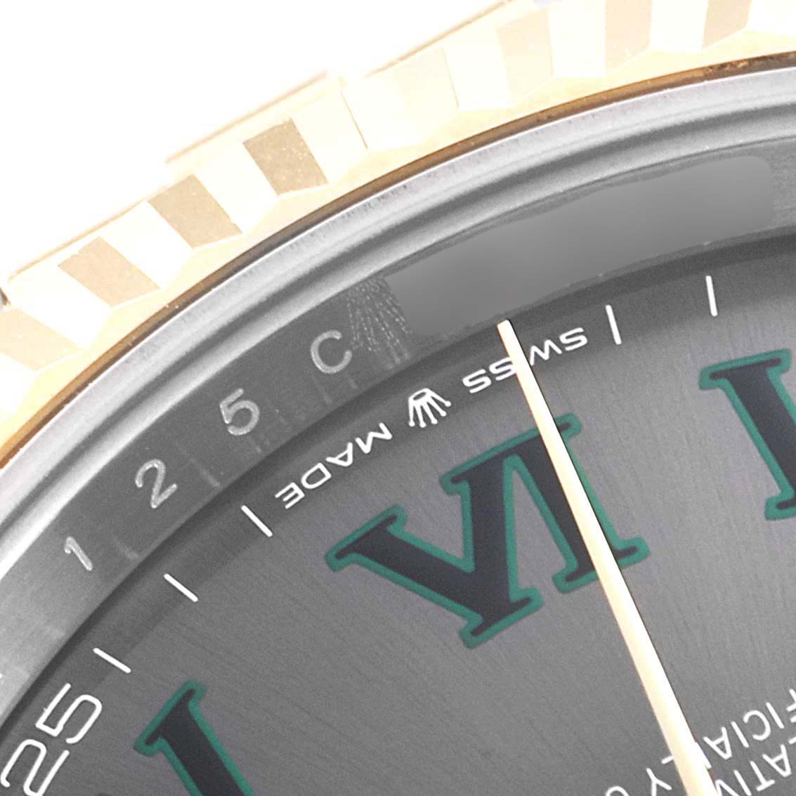 This is a close-up of the Rolex Datejust 41 126333 Men's Steel and Gold (two tone) Grey Dial 126333 Men's Steel and Gold (two tone) Grey Dial watch face, highlighting the dial, Roman numeral markers, and part of the bezel.