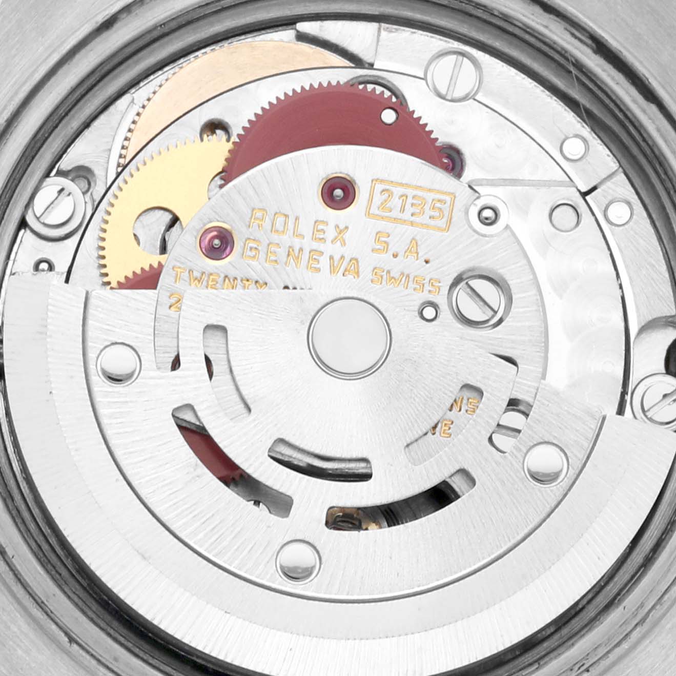 The image shows the movement components of a Rolex Datejust 69173 Women's Steel and Gold (two tone) Beige Dial 69173 Women's Steel and Gold (two tone) Beige Dial, focusing on gears and the rotor.
